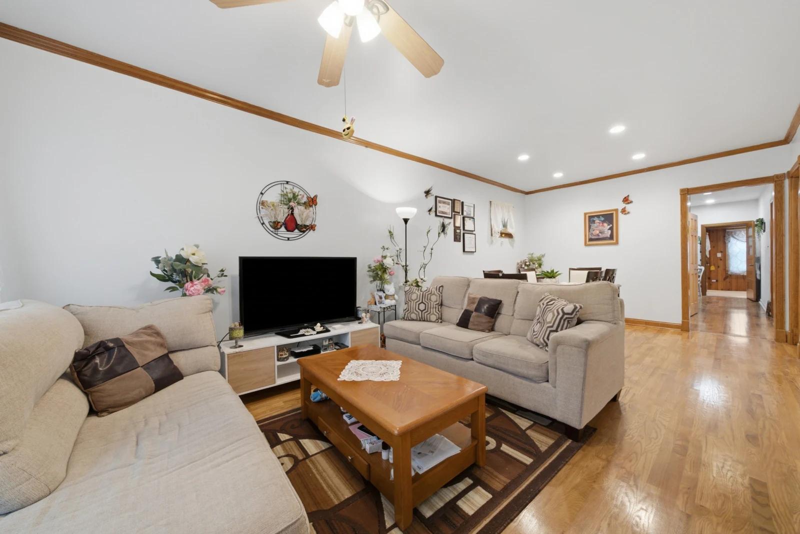 Living and dining rooms with wood flooring