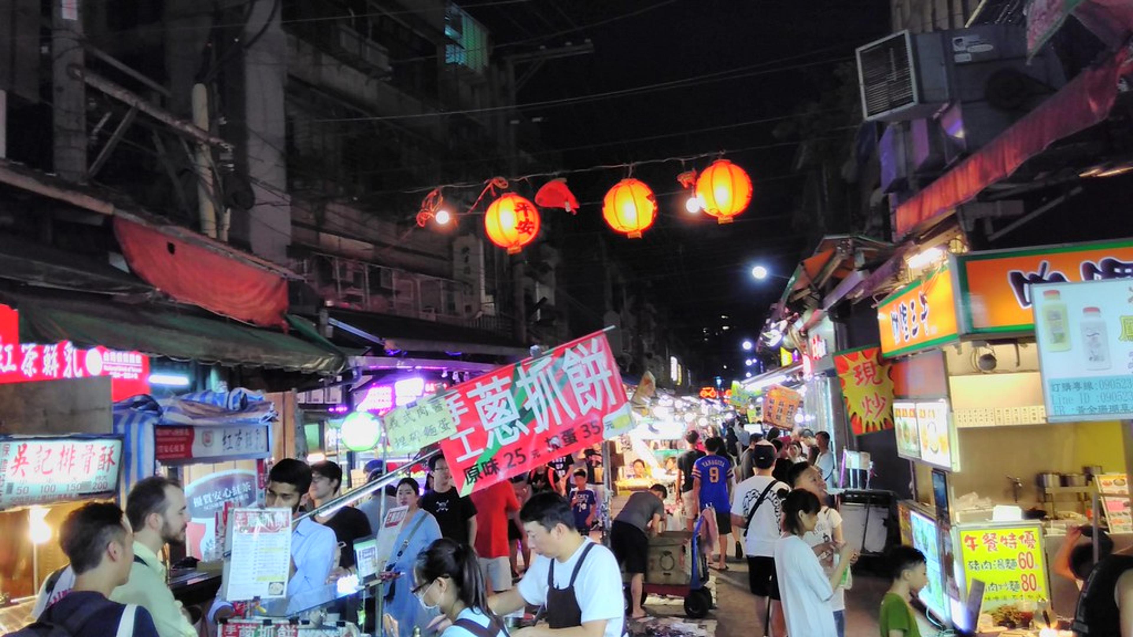 Traveling Taiwan Without Reading Chinese (2026): Night Markets, Bento Counters, Ticket Gates and the Receipt Lottery - English carries you through Taiwan’s airports, metros and highway signs, then disappears at the handwritten stall sign in front of you — here is what those signs, buffet counters, ticket gates and receipts actually say.