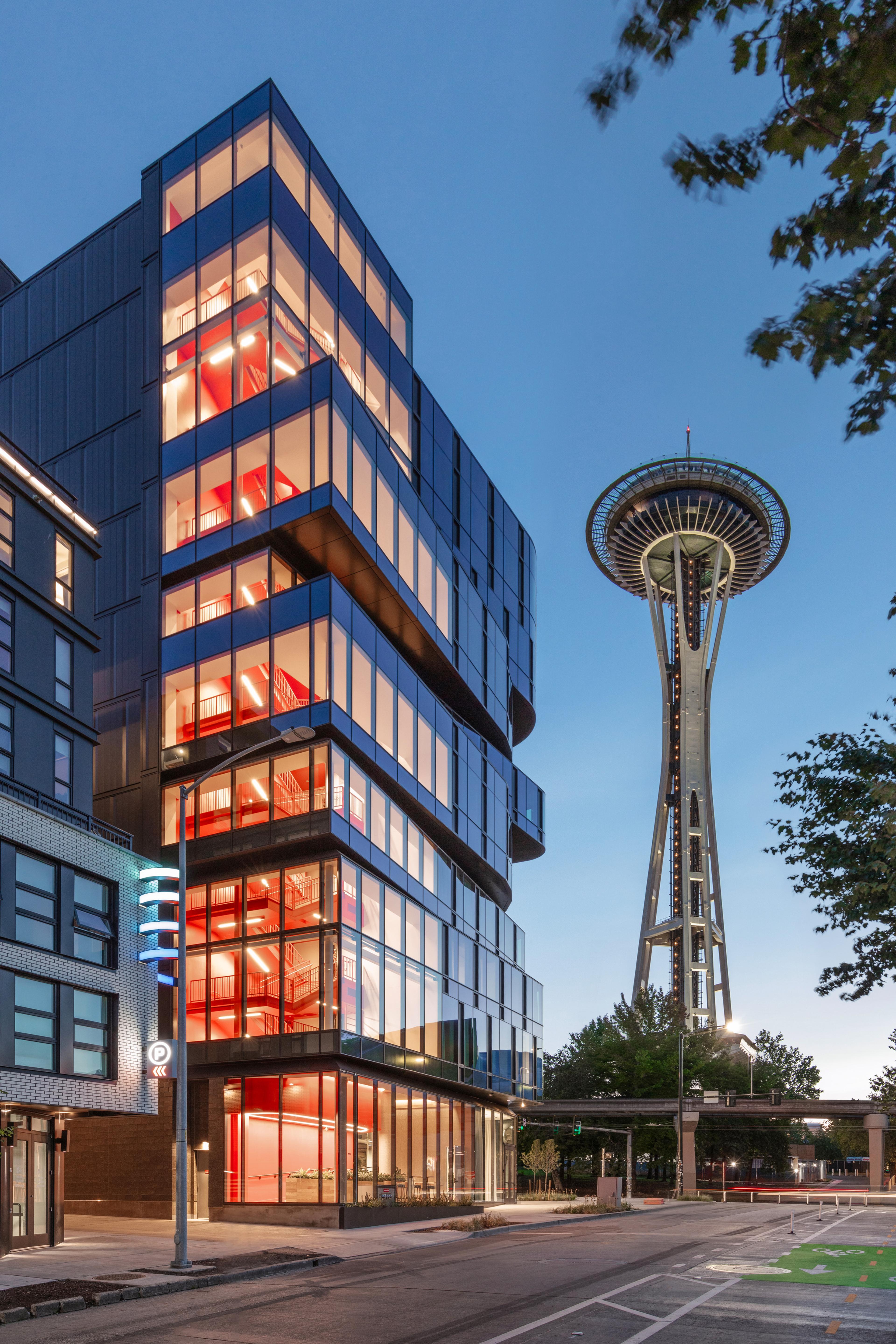 222 Fifth exterior view in the evening with Space Needle