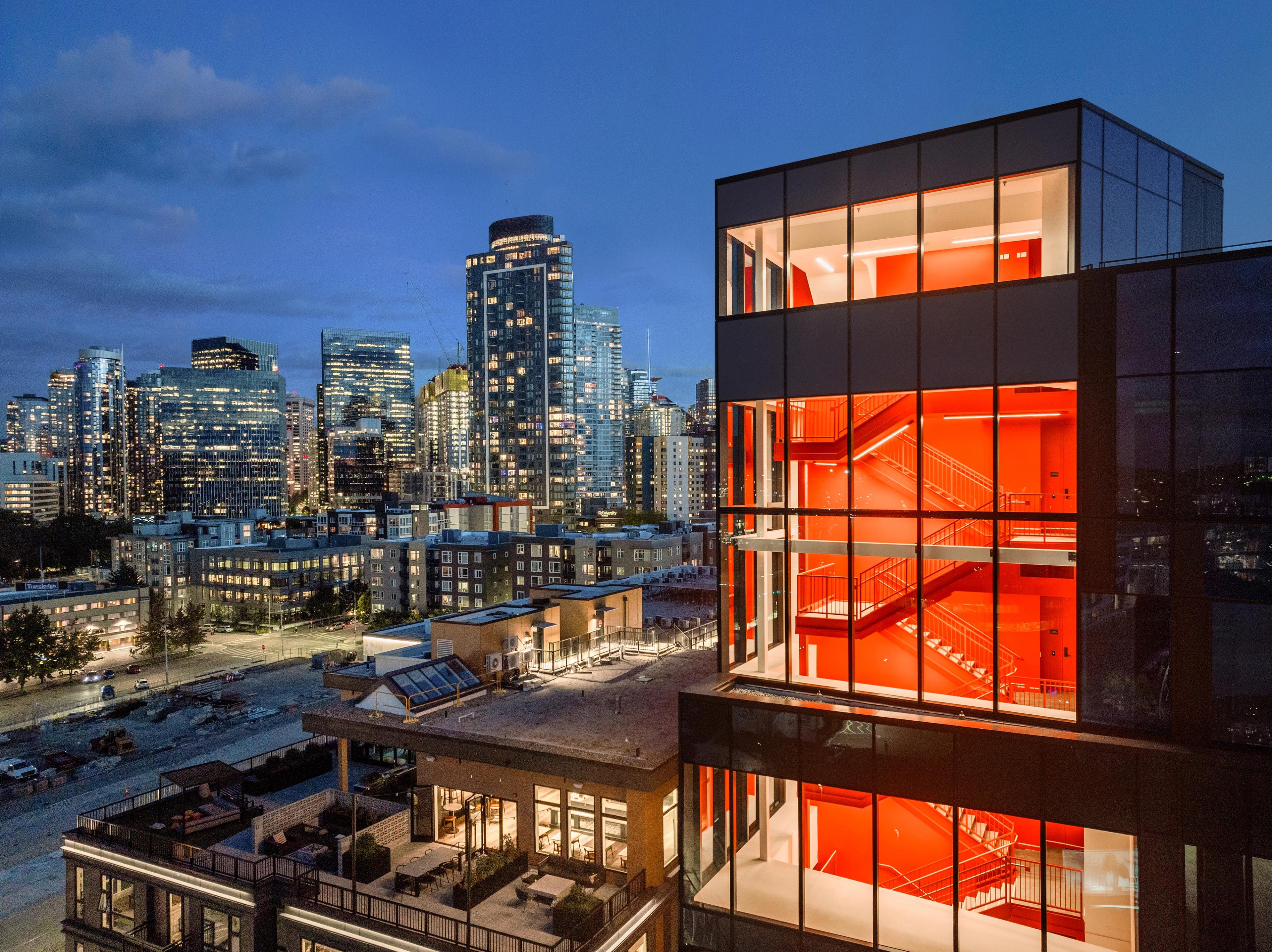 222 Fifth bird's eye view at night with Seattle city skyline