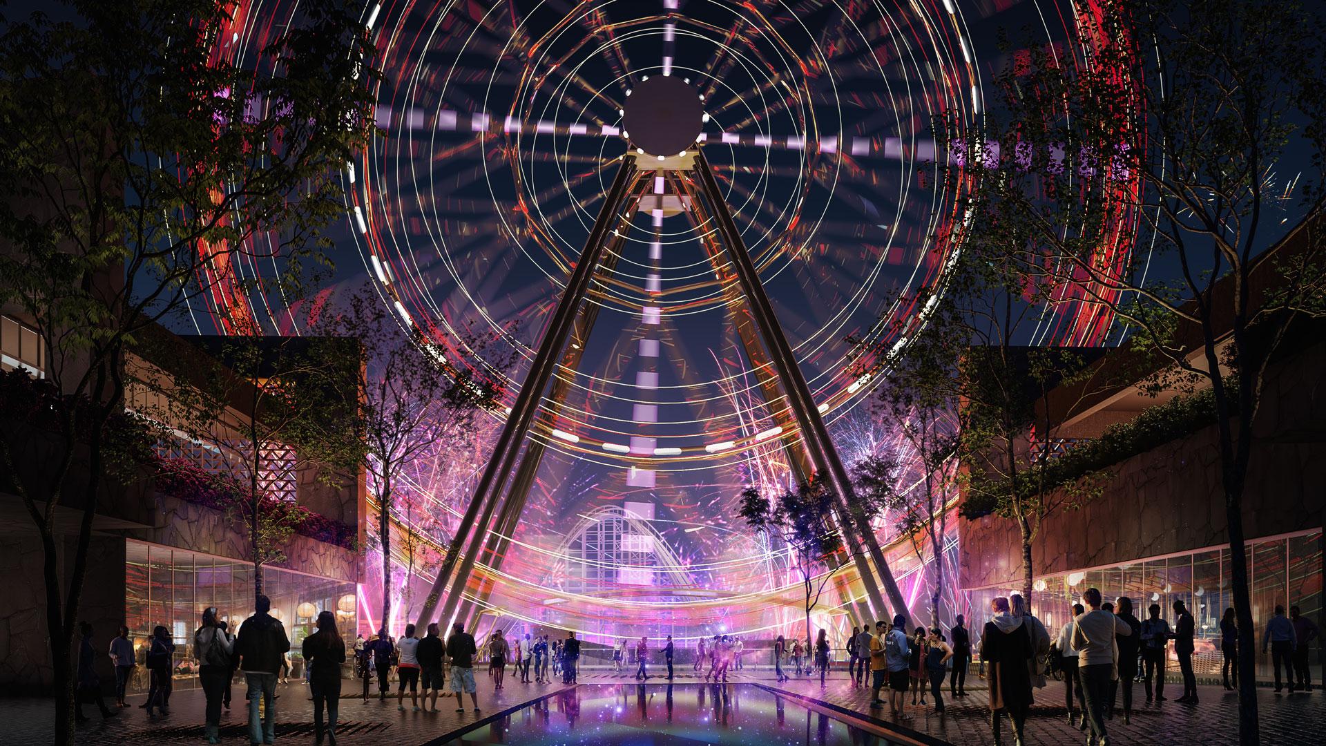 A group of people walking around a large circular structure with lights.