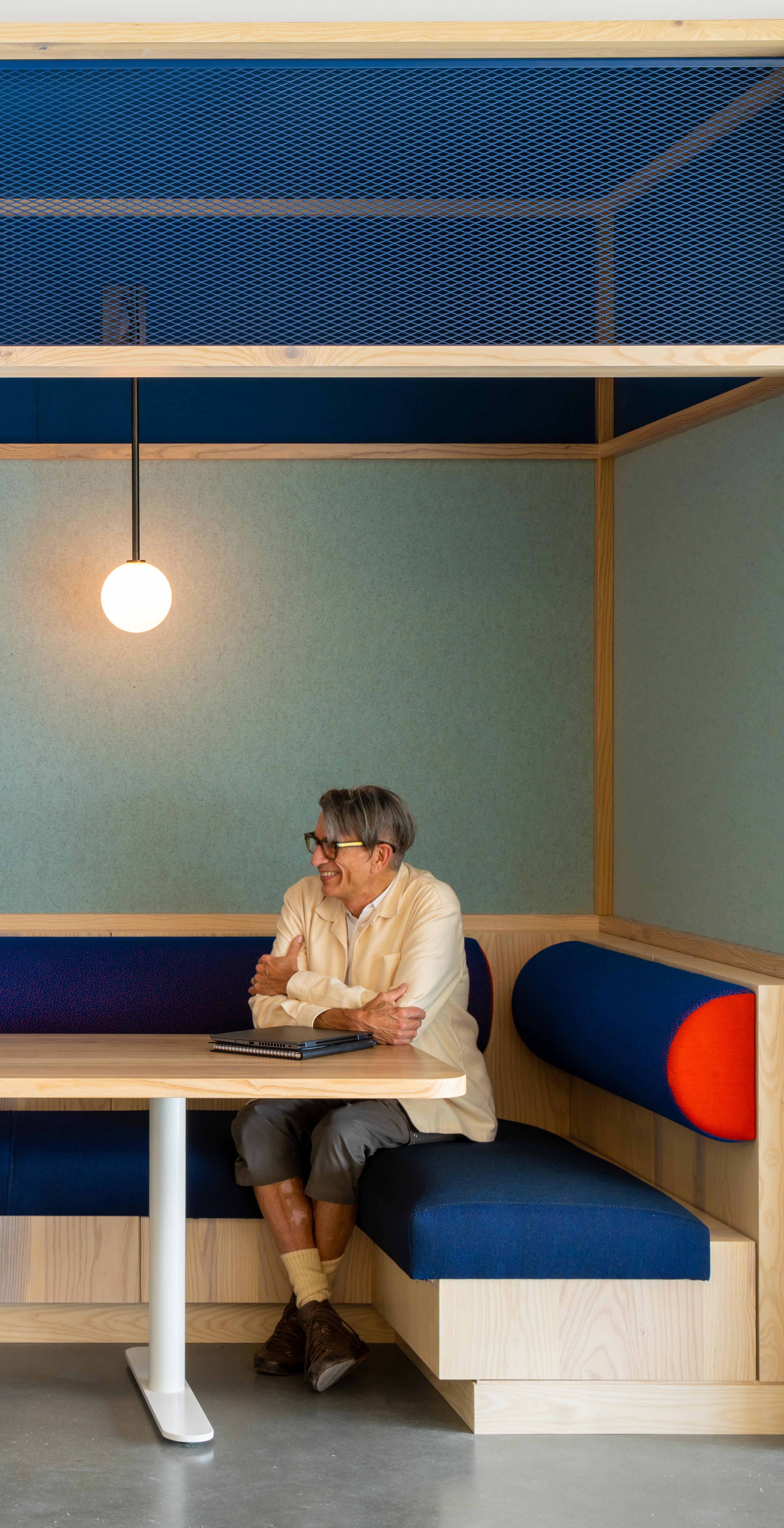 A group of people sitting at a table.