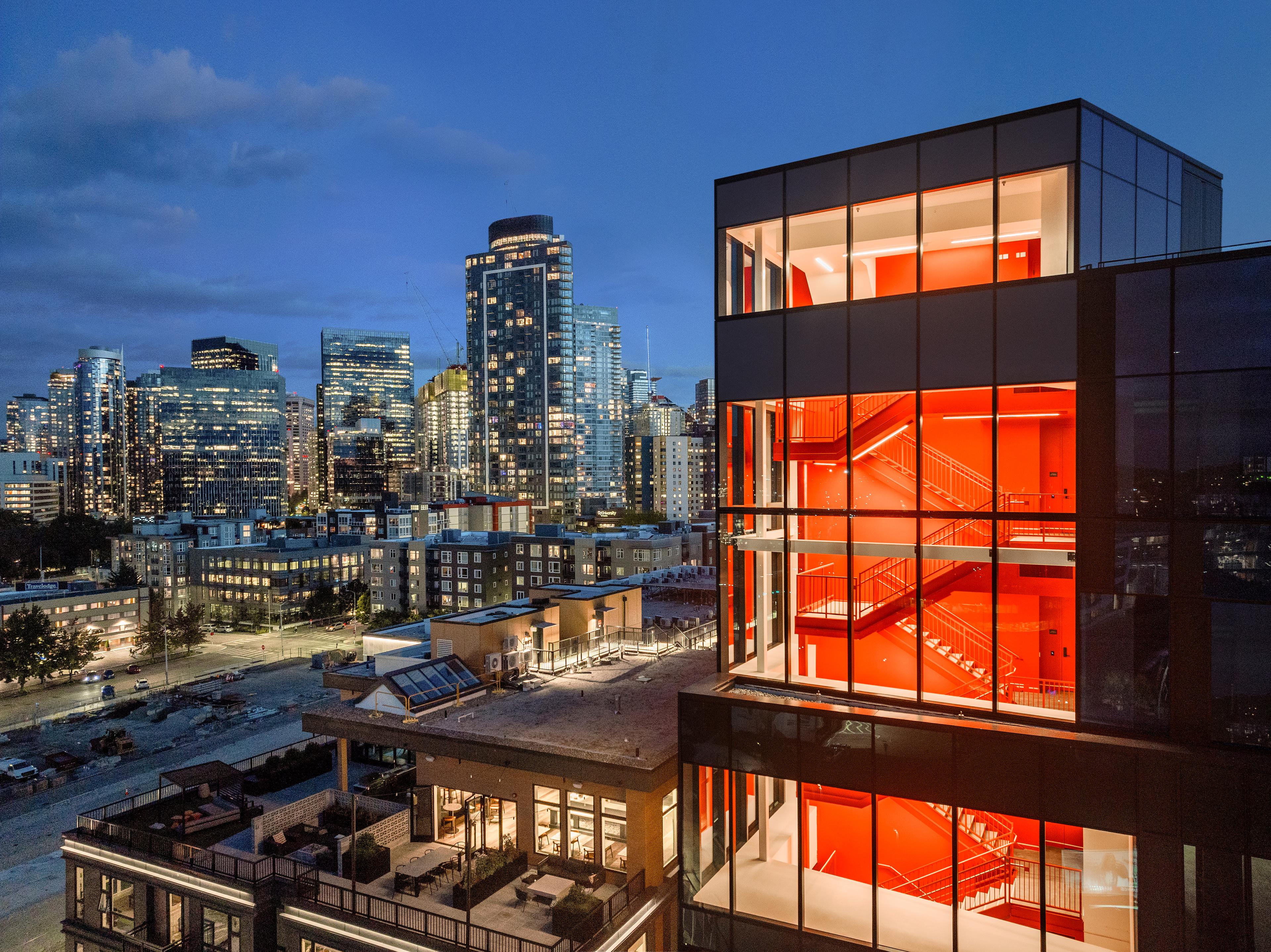 222 Fifth bird's eye view at night with Seattle city skyline
