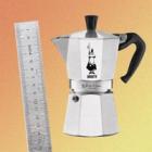 A moka pot on a gradient background with a ruler