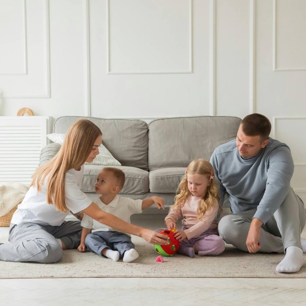 Family enjoying quality time together in a comfortable Homesquare custom-built home.