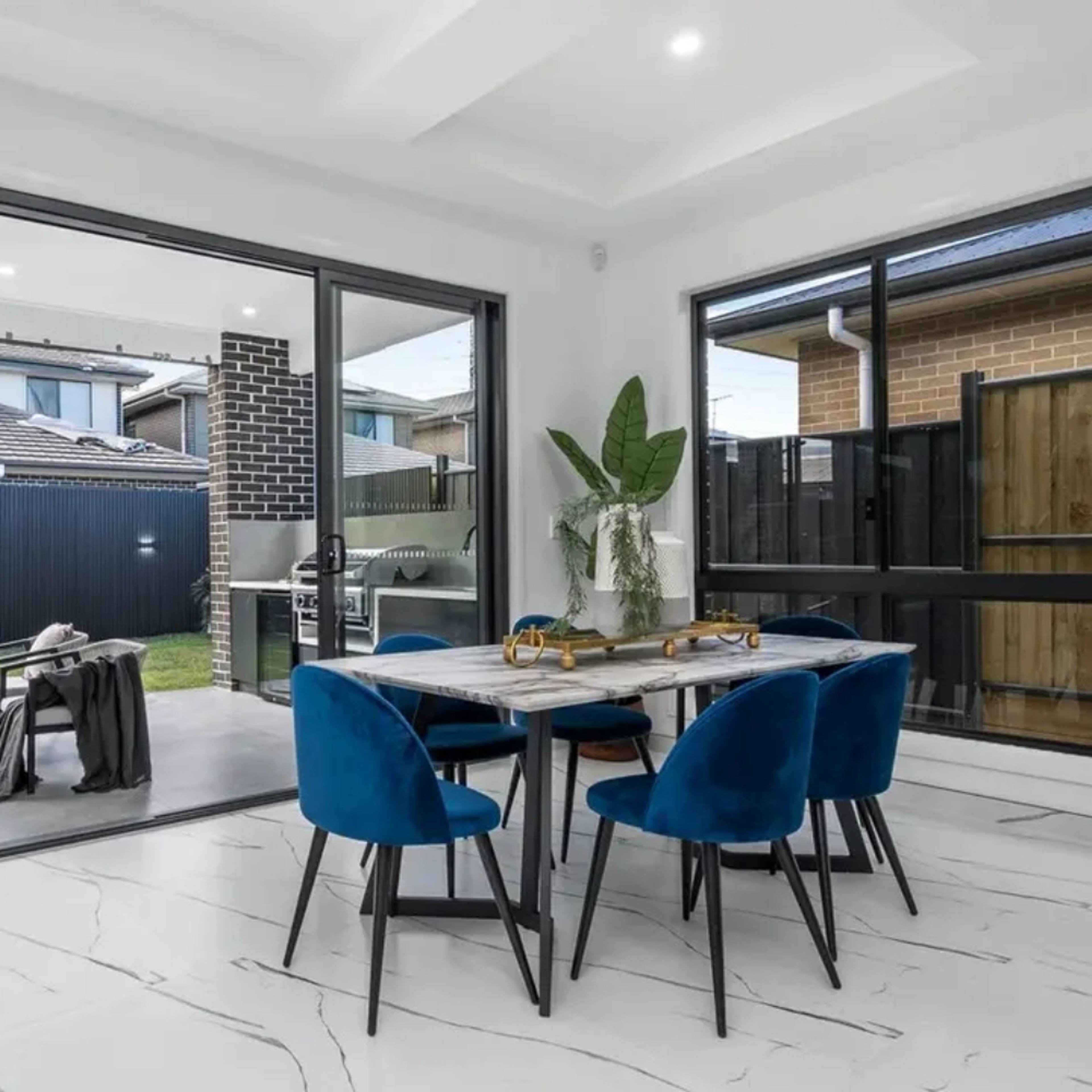 Modern dining area with alfresco access and outdoor entertaining space