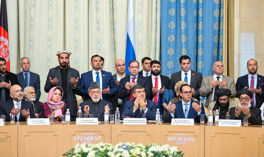 Participants gathered at a conference table during talks on Afghanistan in Moscow.
