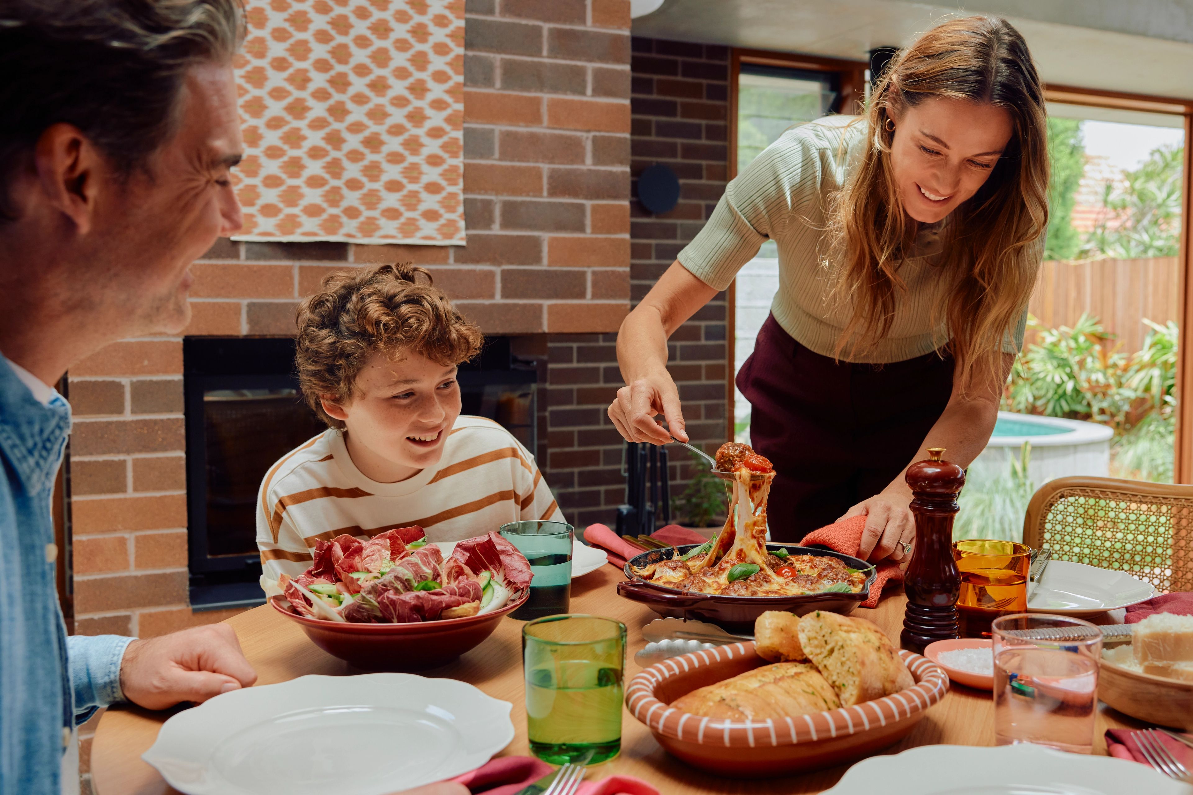 Family together at the dinner table 