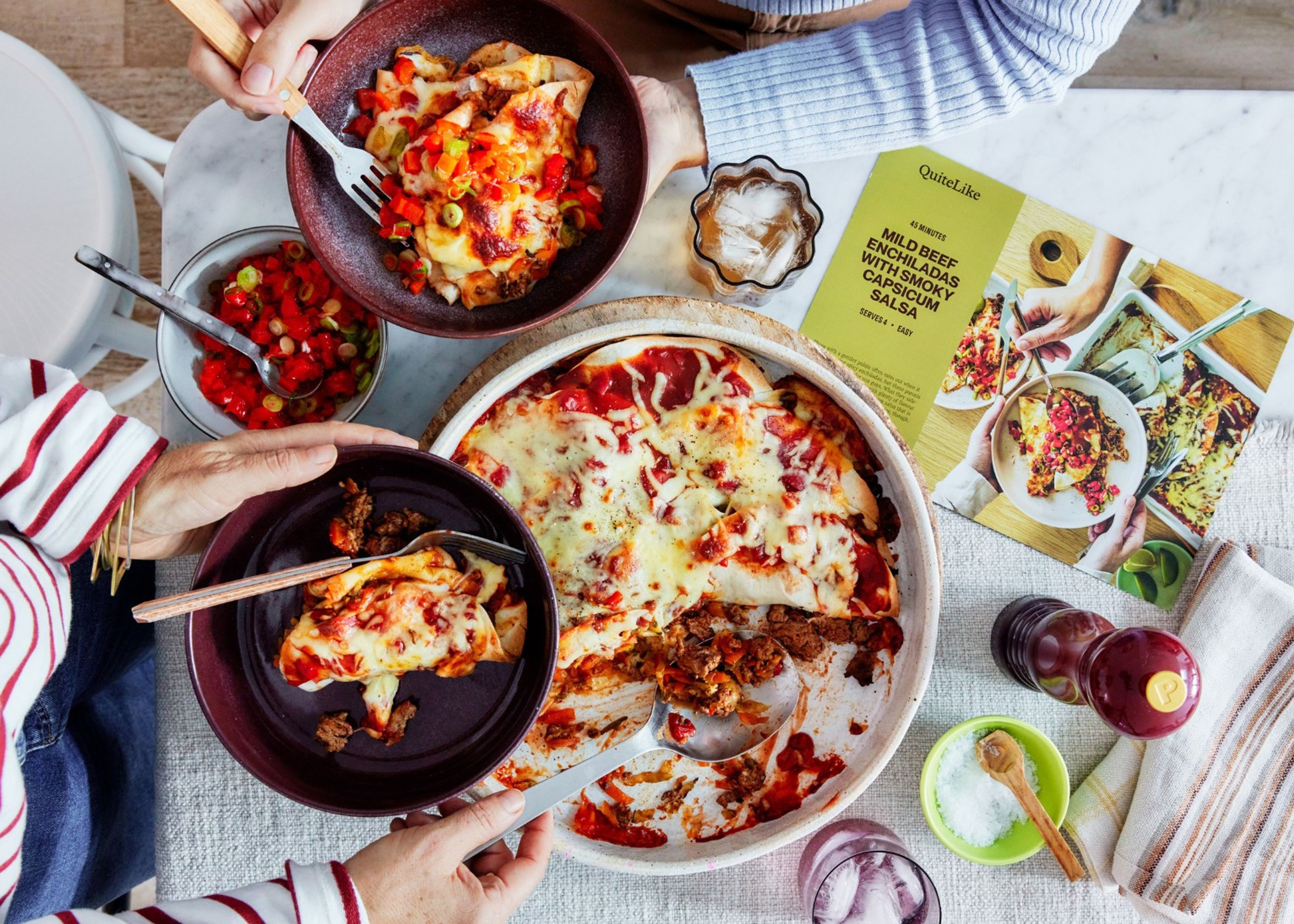 Mild beef enchiladas served at the table