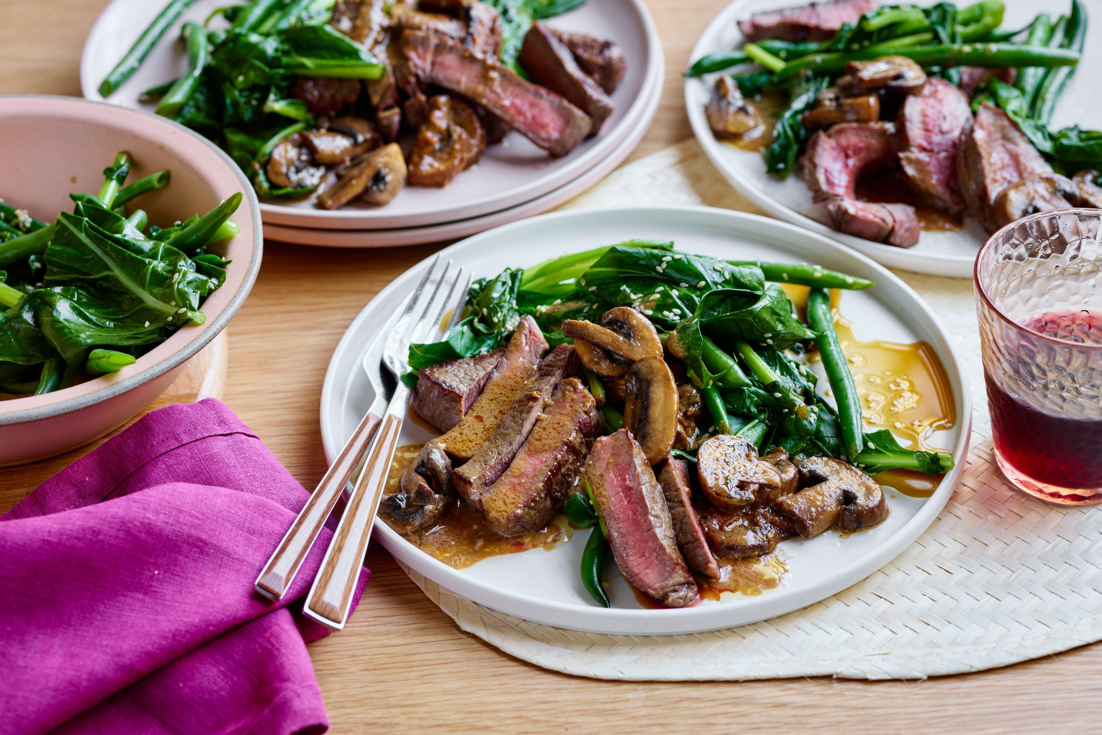 Fast steaks with miso mushrooms and greens