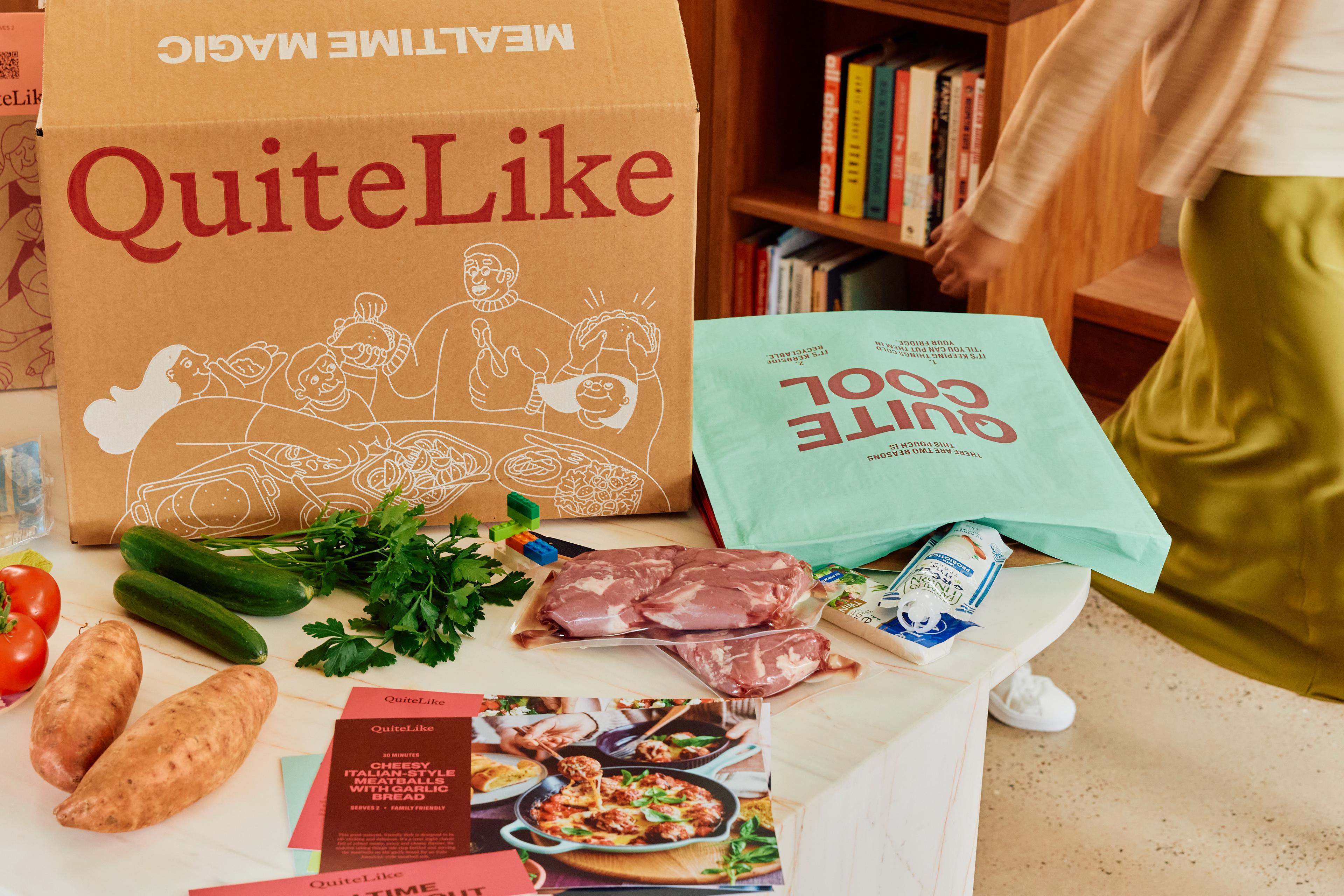 Box on counter with ingredients, meal bags and recipe cards
