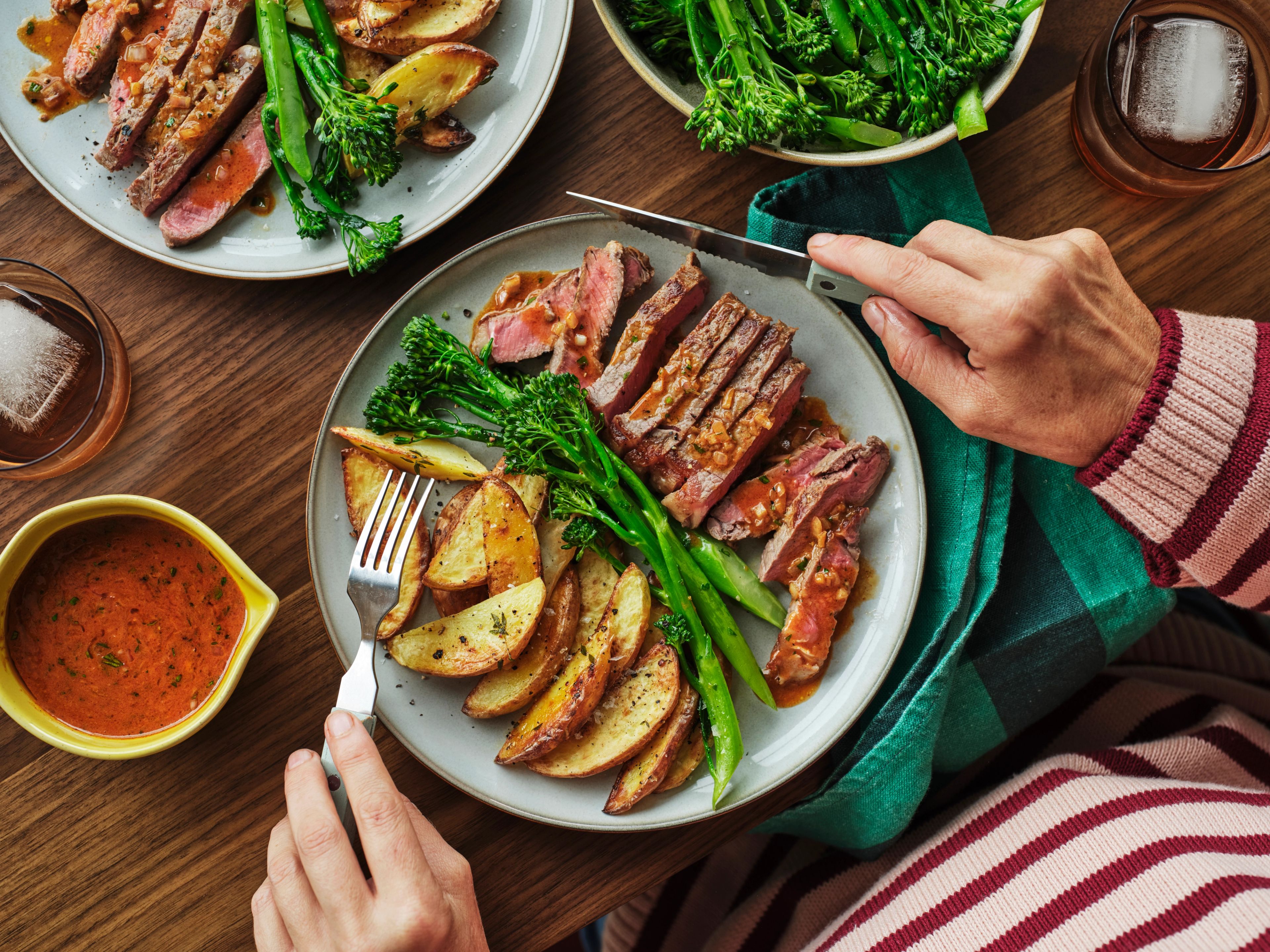 Porterhouse Steaks with Café de Paris Butter, Potatoes and Broccolini