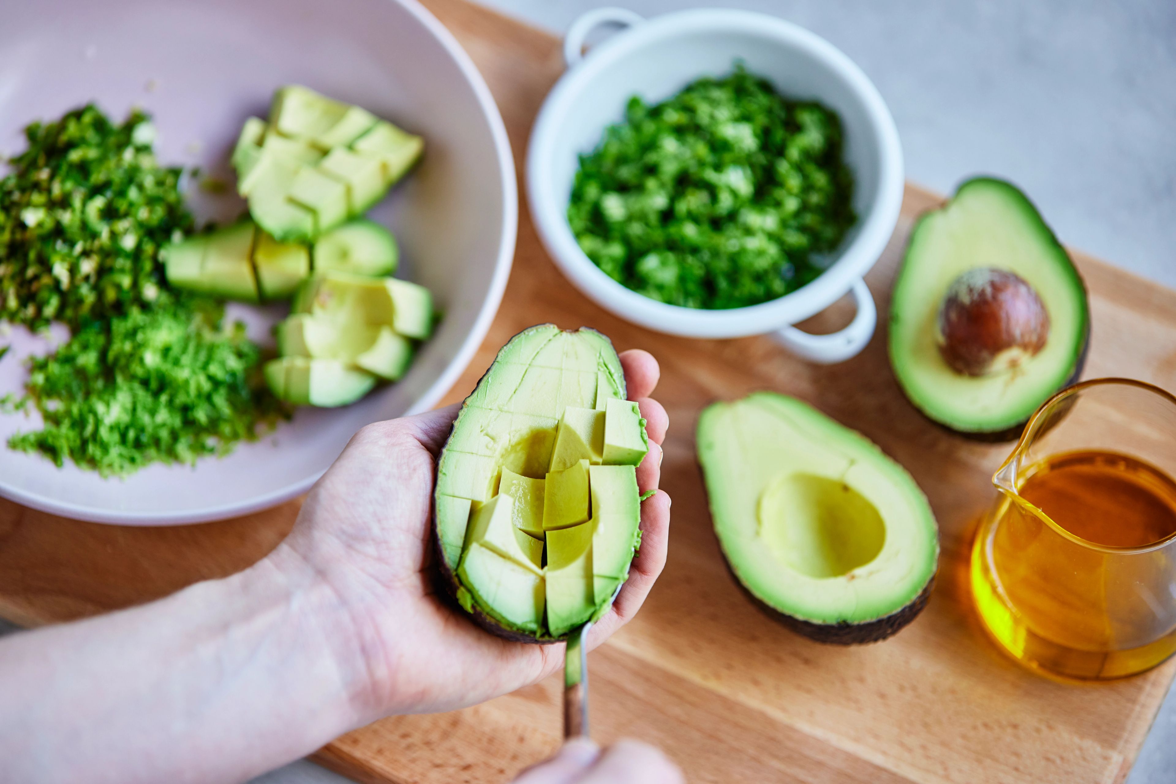 fresh avocado being prepared for salsa