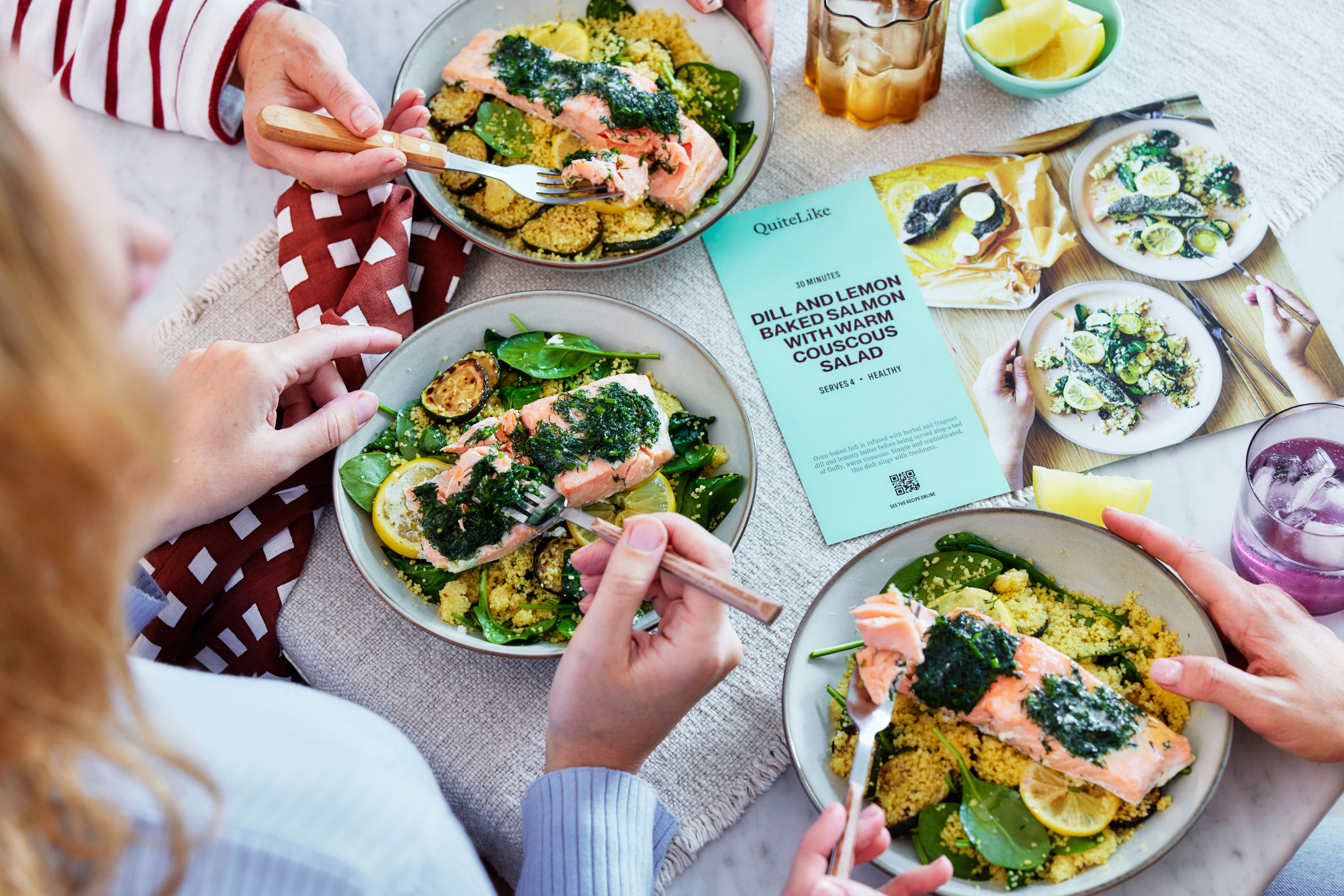 quitelike baked salmon recipe with recipe cards on table