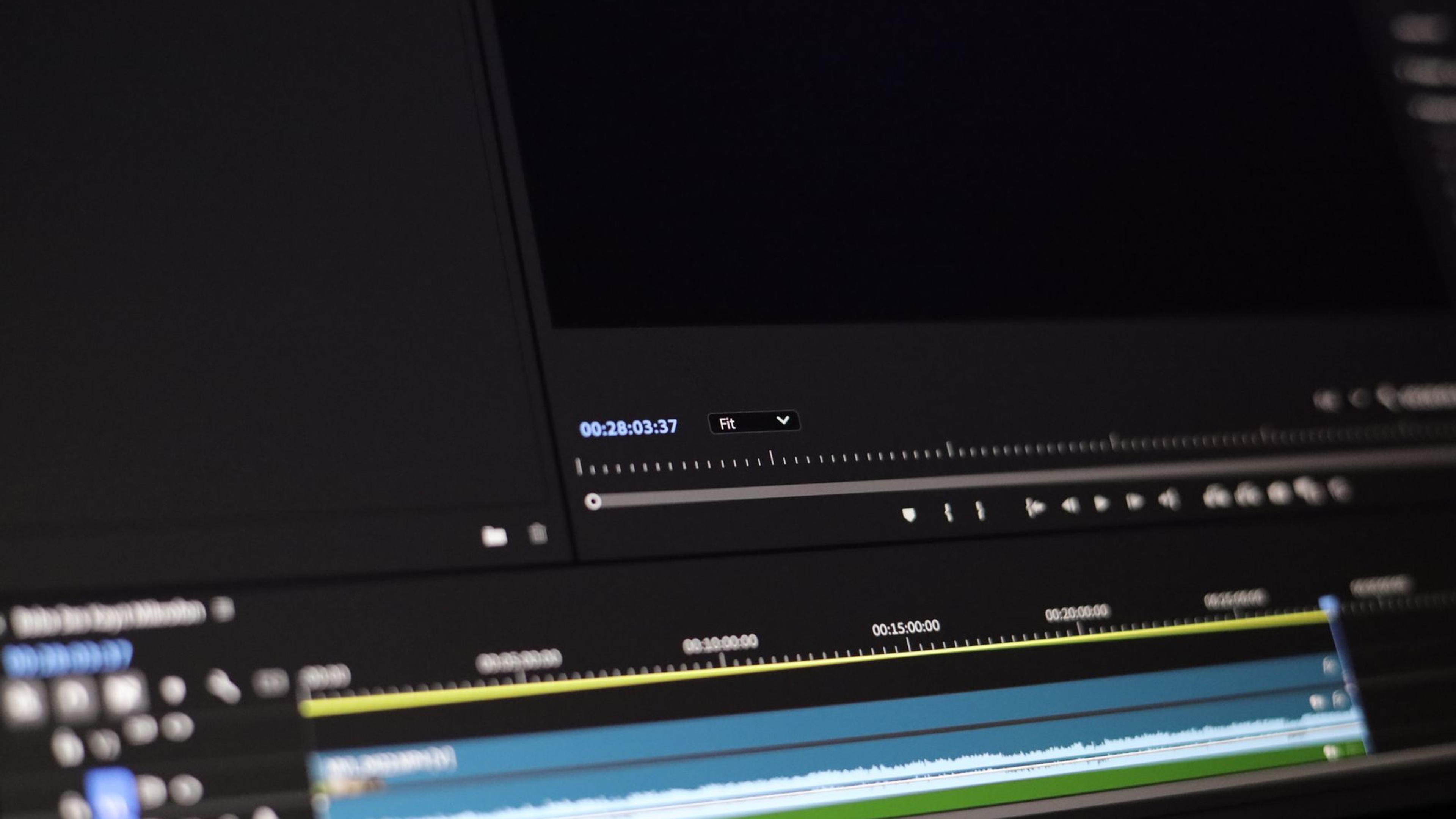 Close-up of video editing software showing a timeline and playback controls
