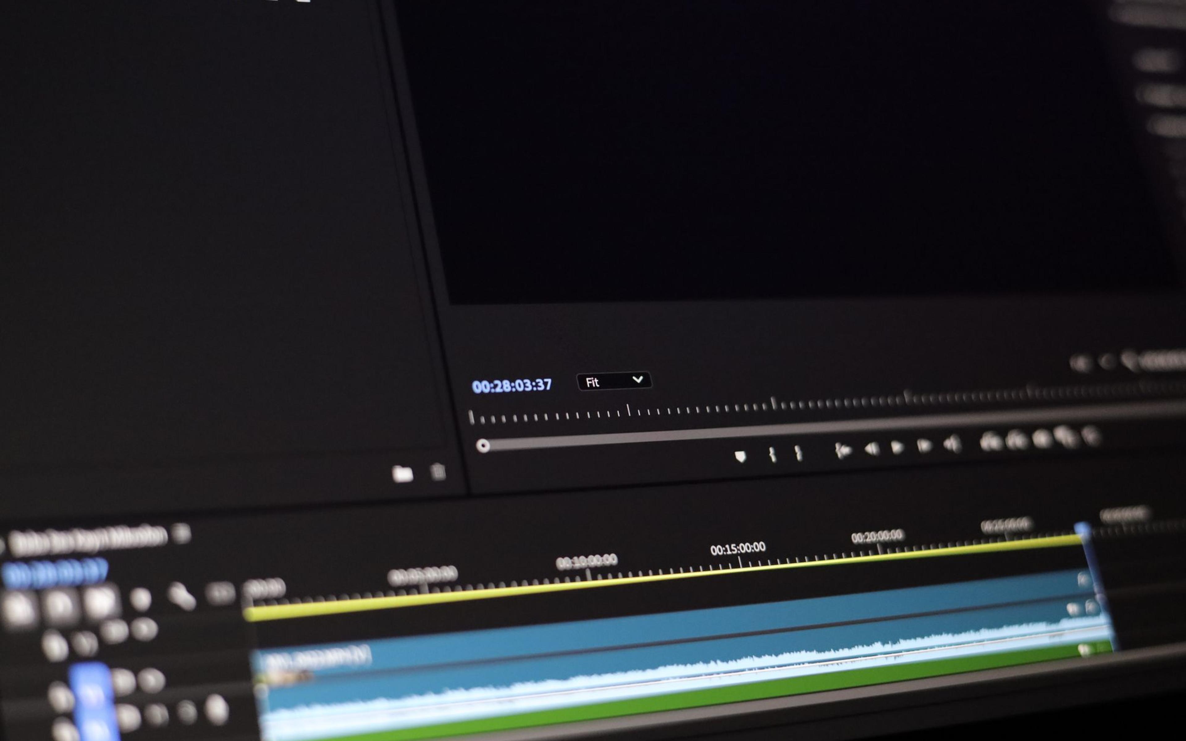 Close-up of video editing software showing a timeline and playback controls