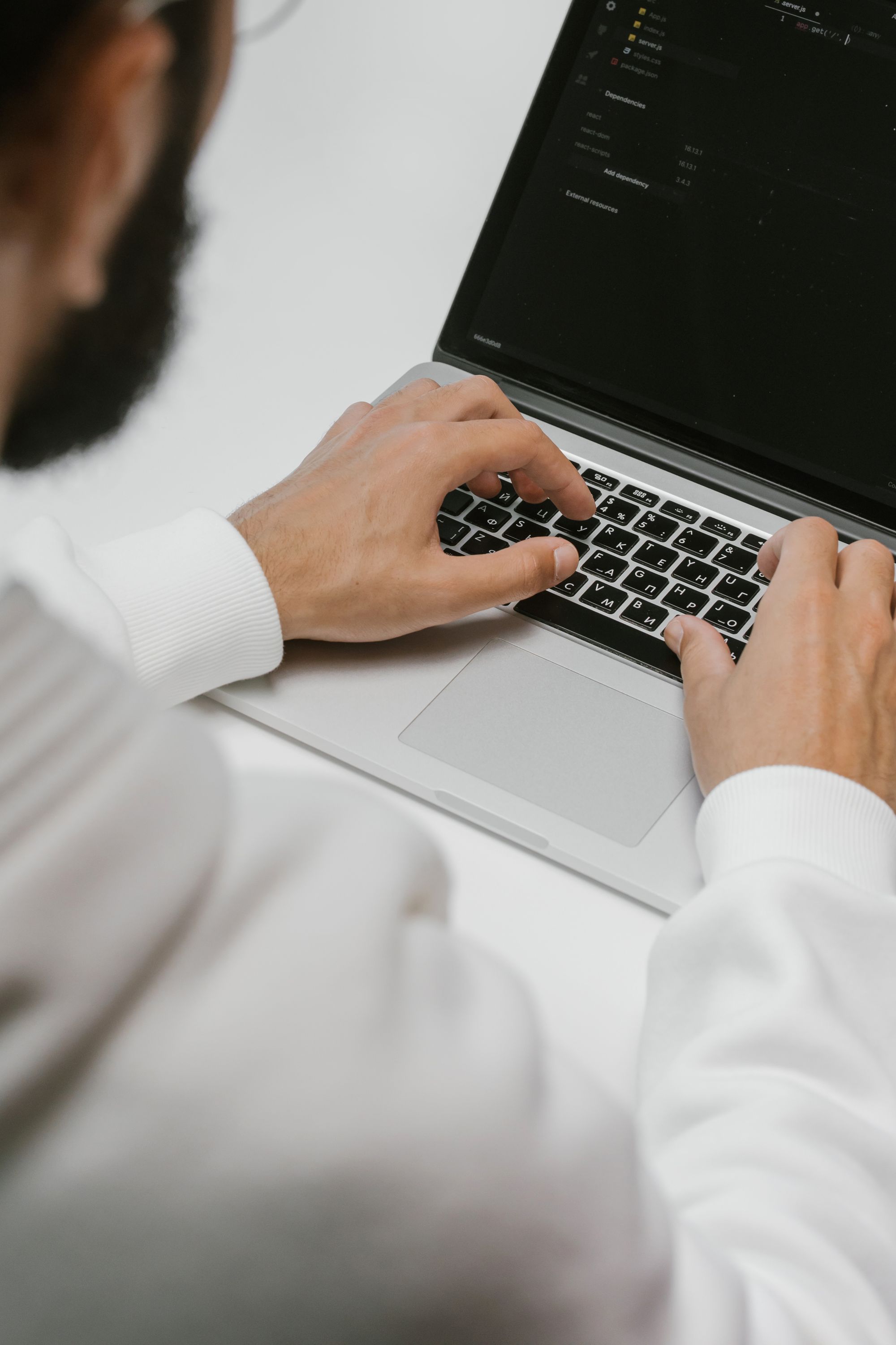 A developer working at a laptop