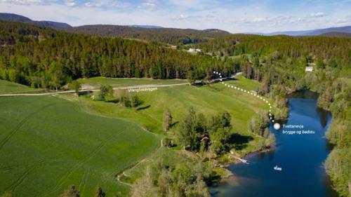 Drone view of Tveitanevja - location of Skogens rom Sauna marked