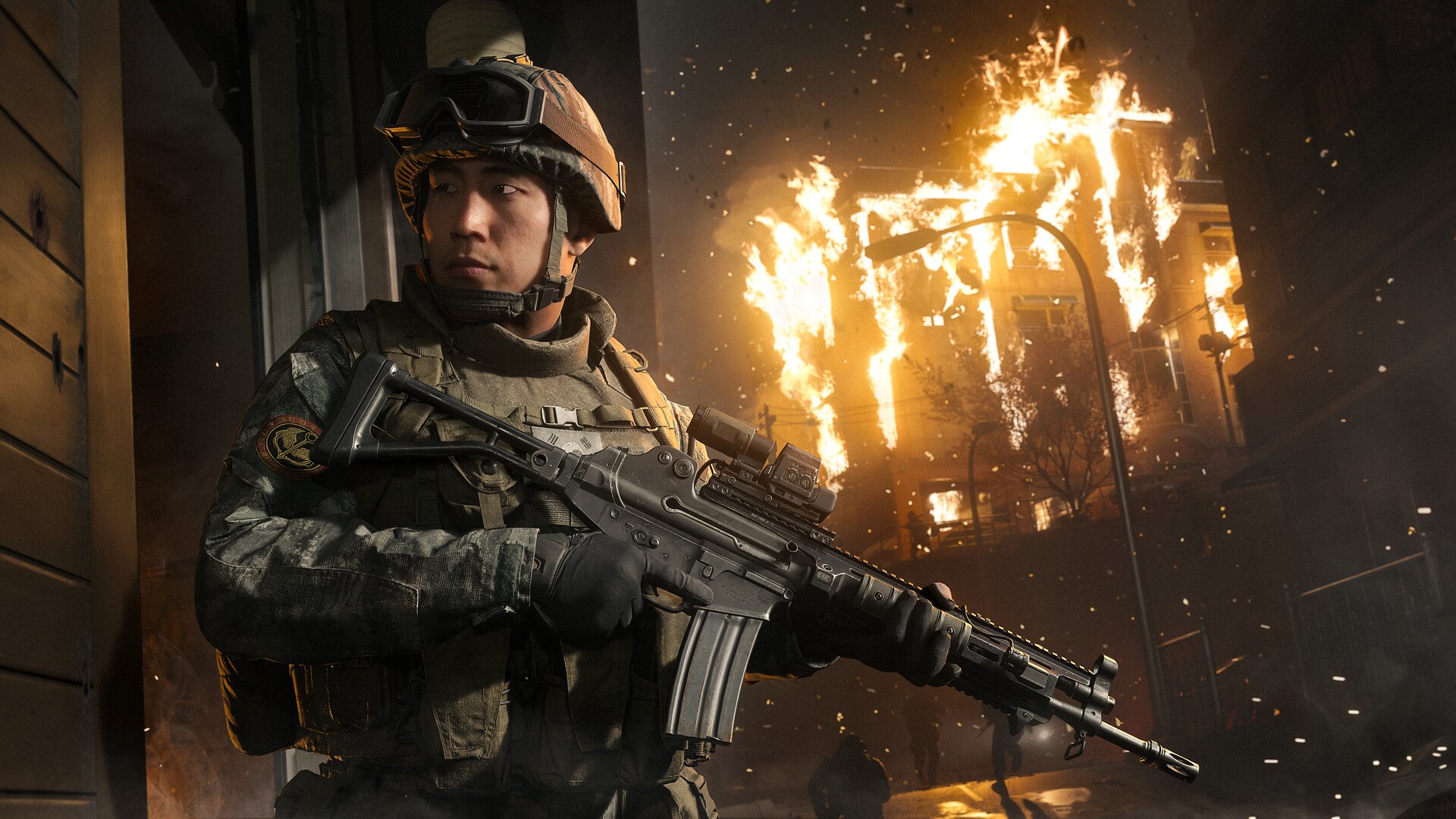 Soldado em combate com um prédio em chamas ao fundo em Call of Duty: Modern Warfare 4