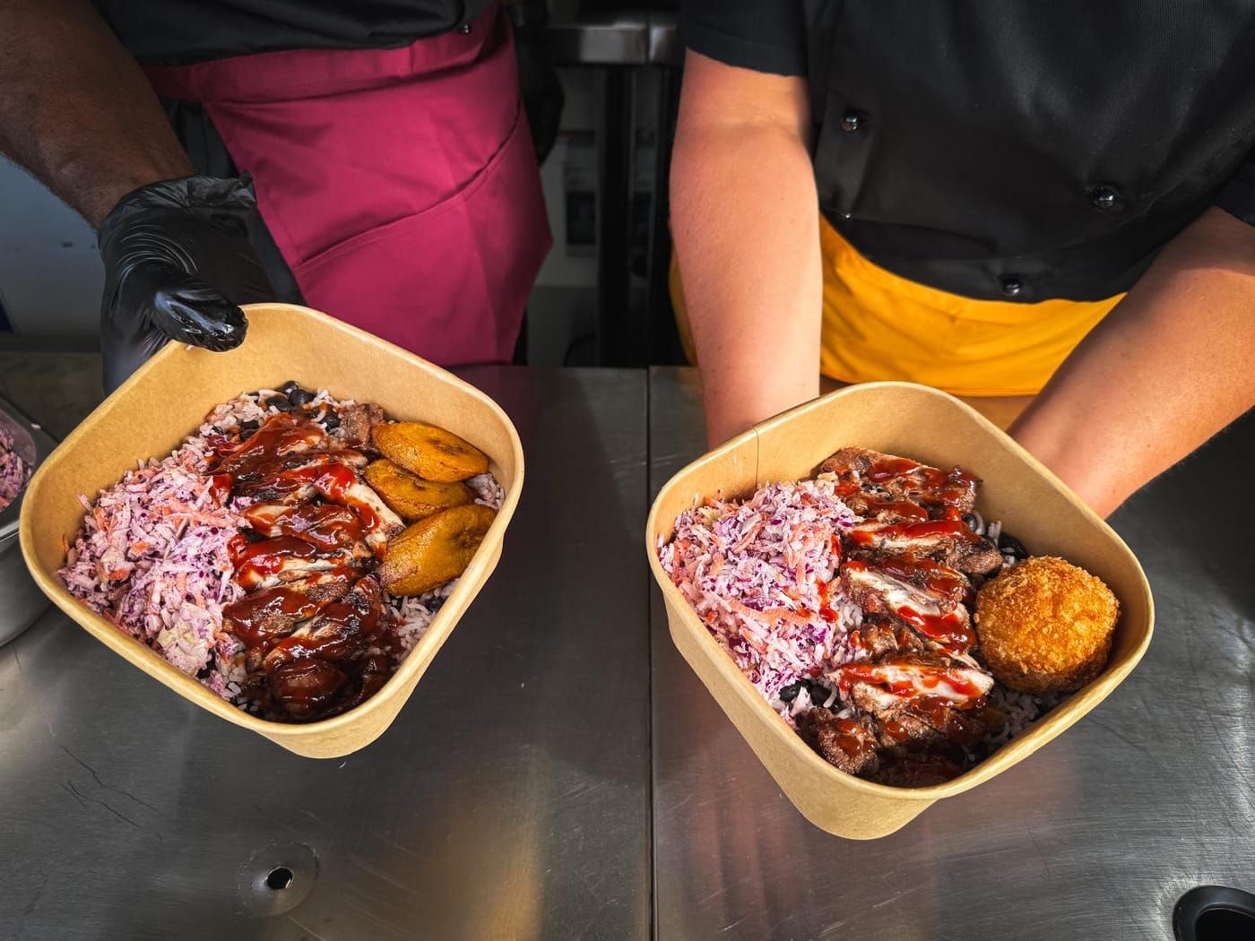 Two jerk chicken bowls ready to serve