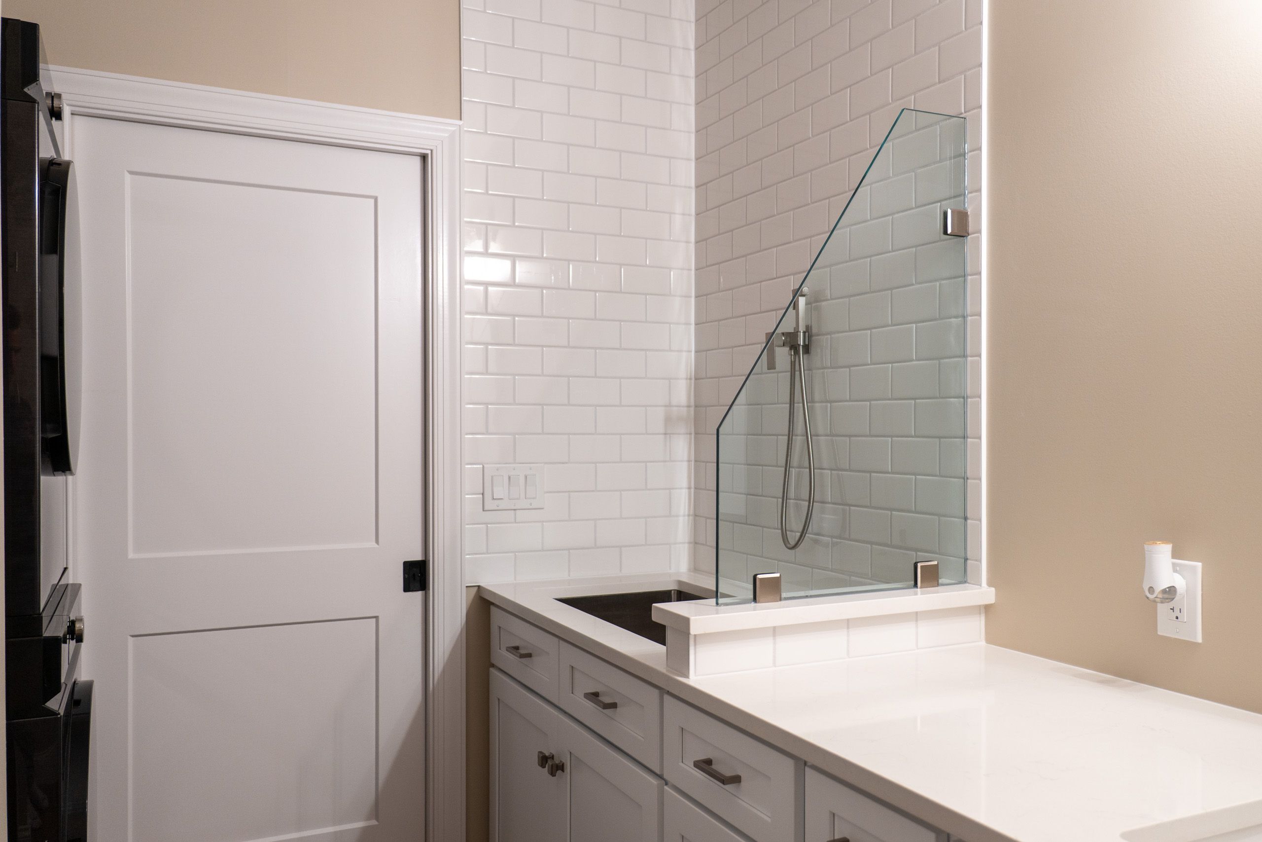 Dog wash station with white tile