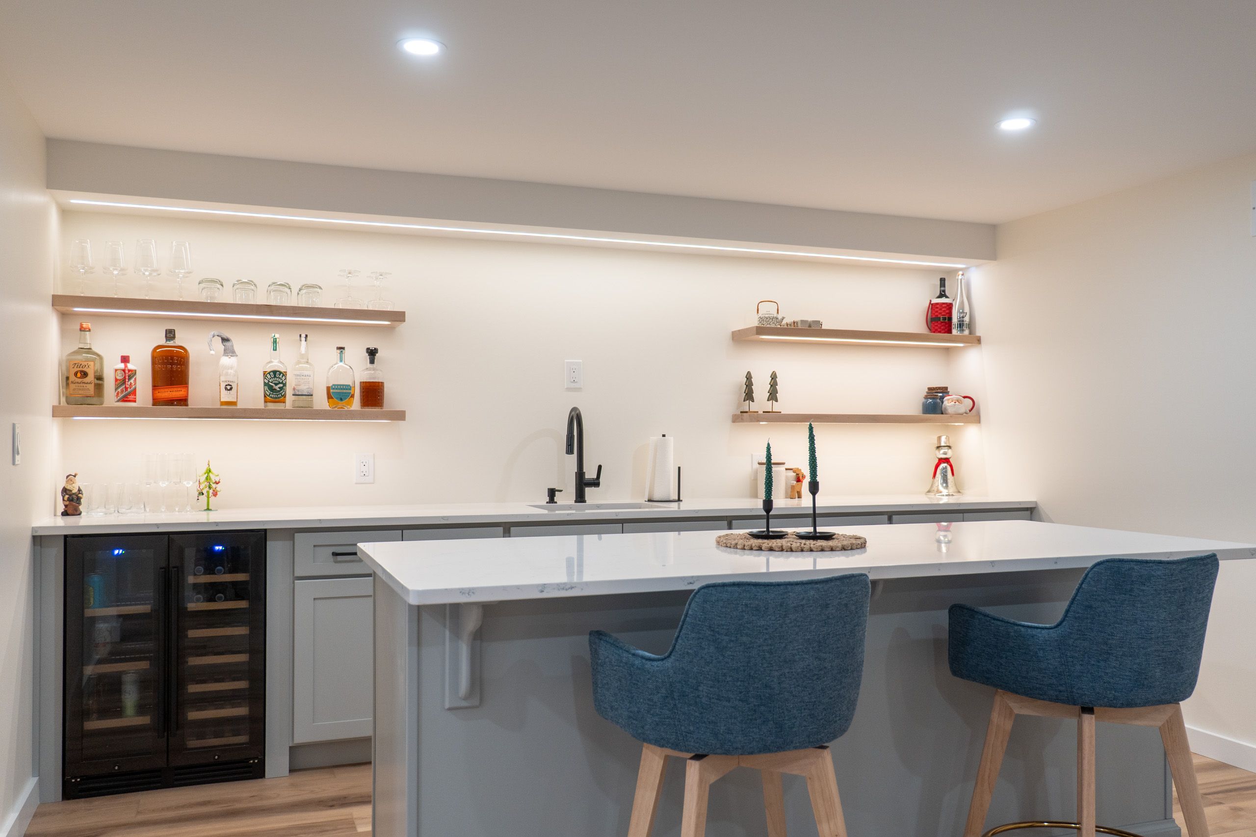 Wet bar and island in remodeled basement