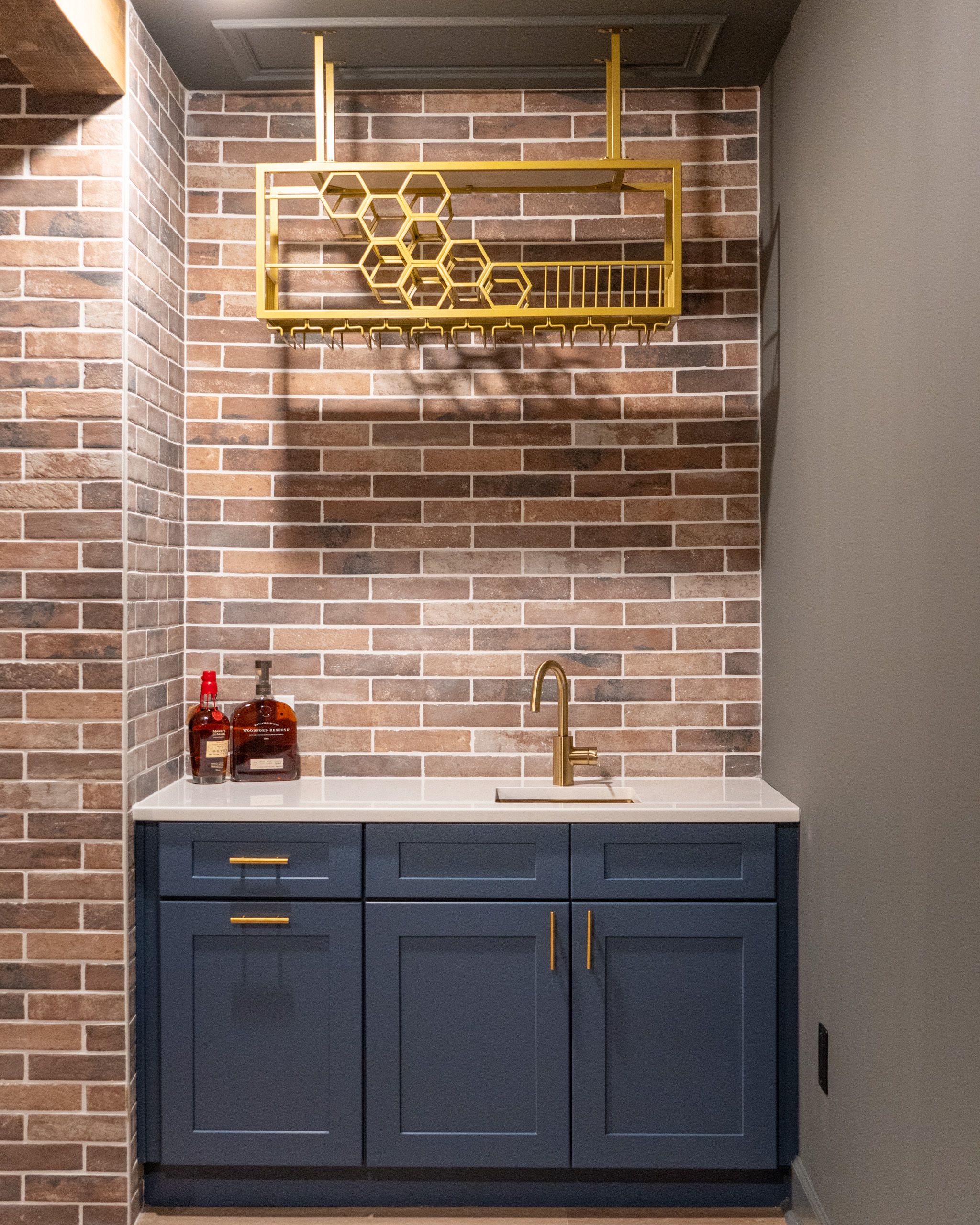 Wet bar with blue cabinets