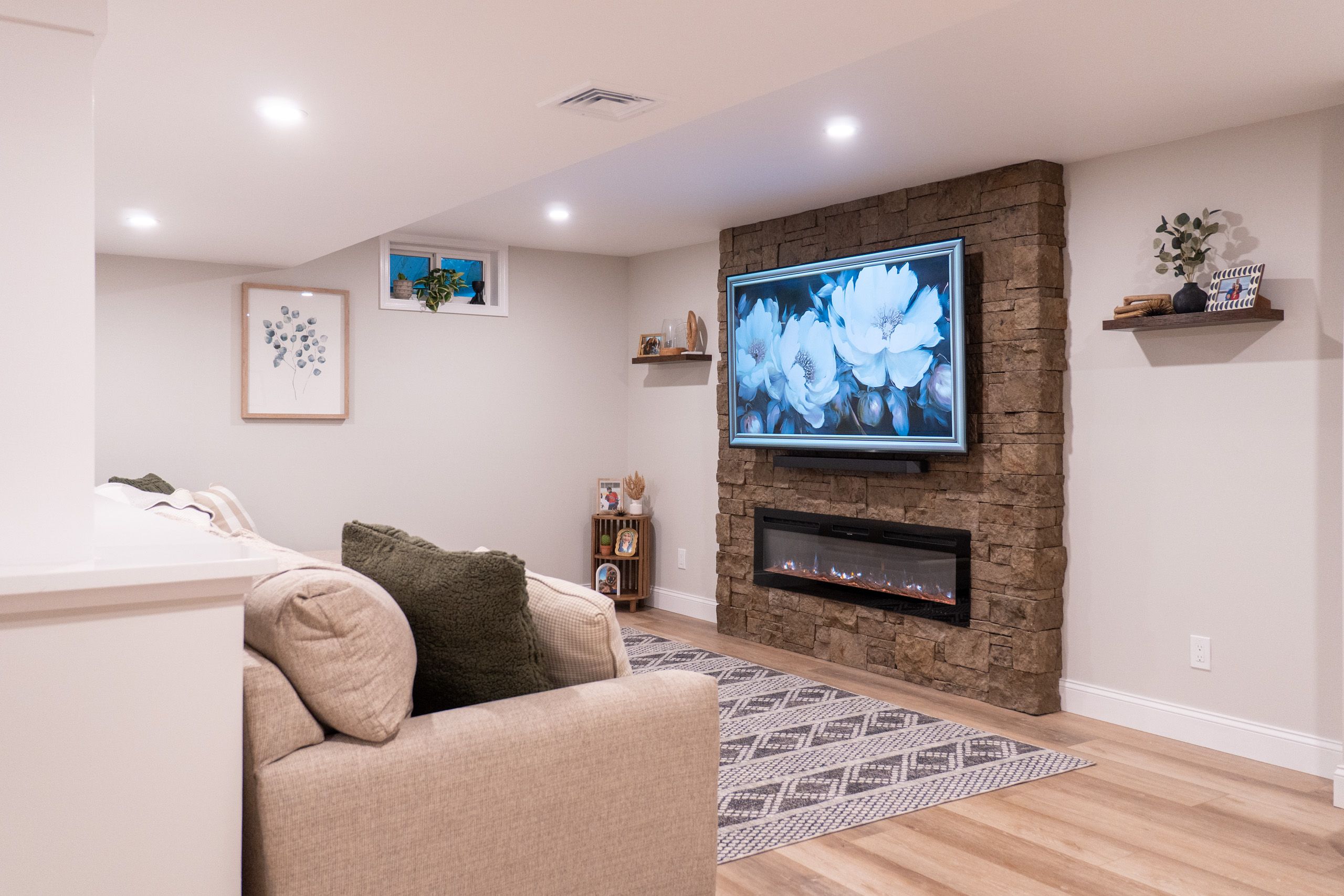 Faux stone entertainment wall with electric fireplace