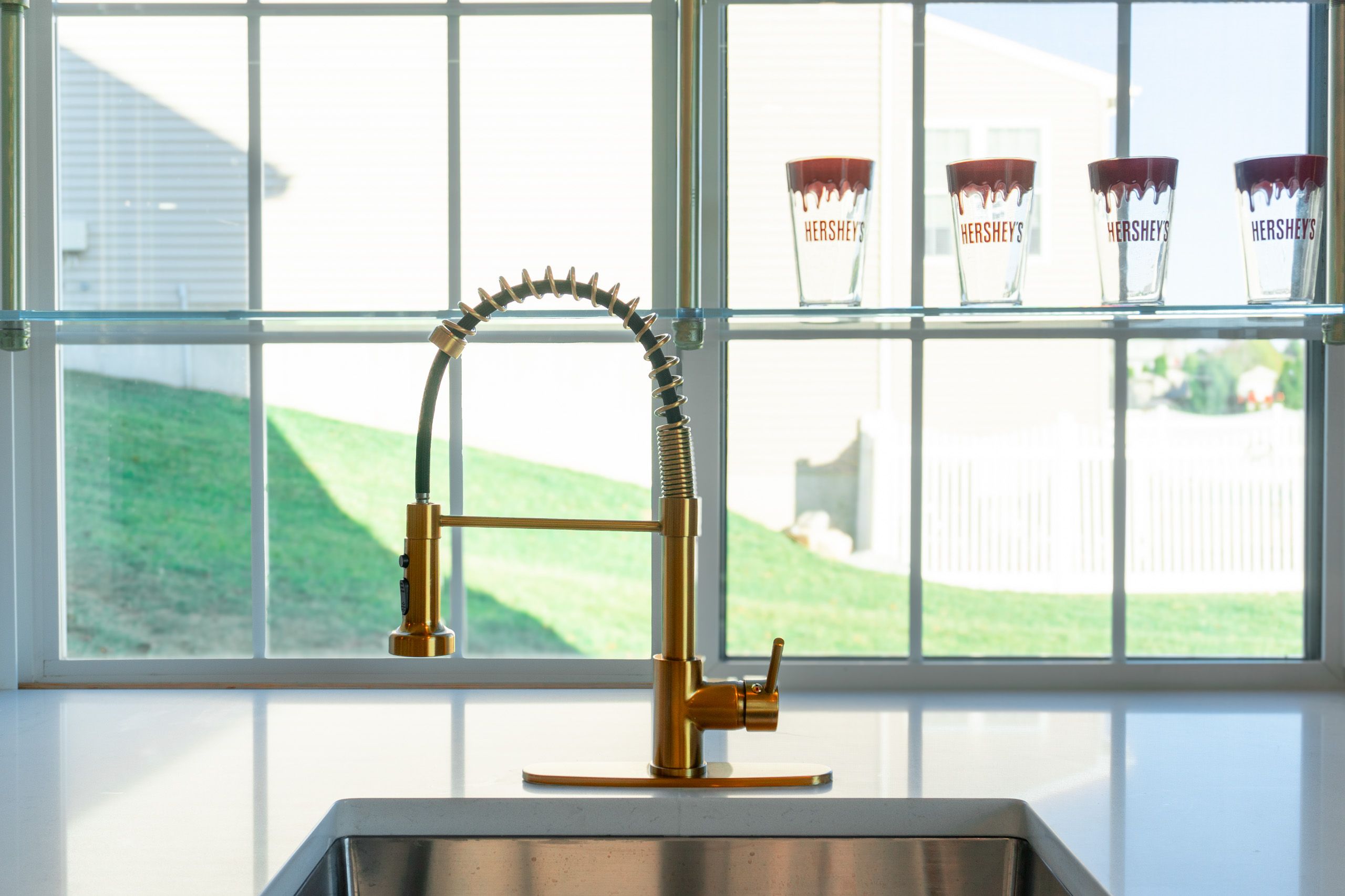 Gold-colored wet bar faucet