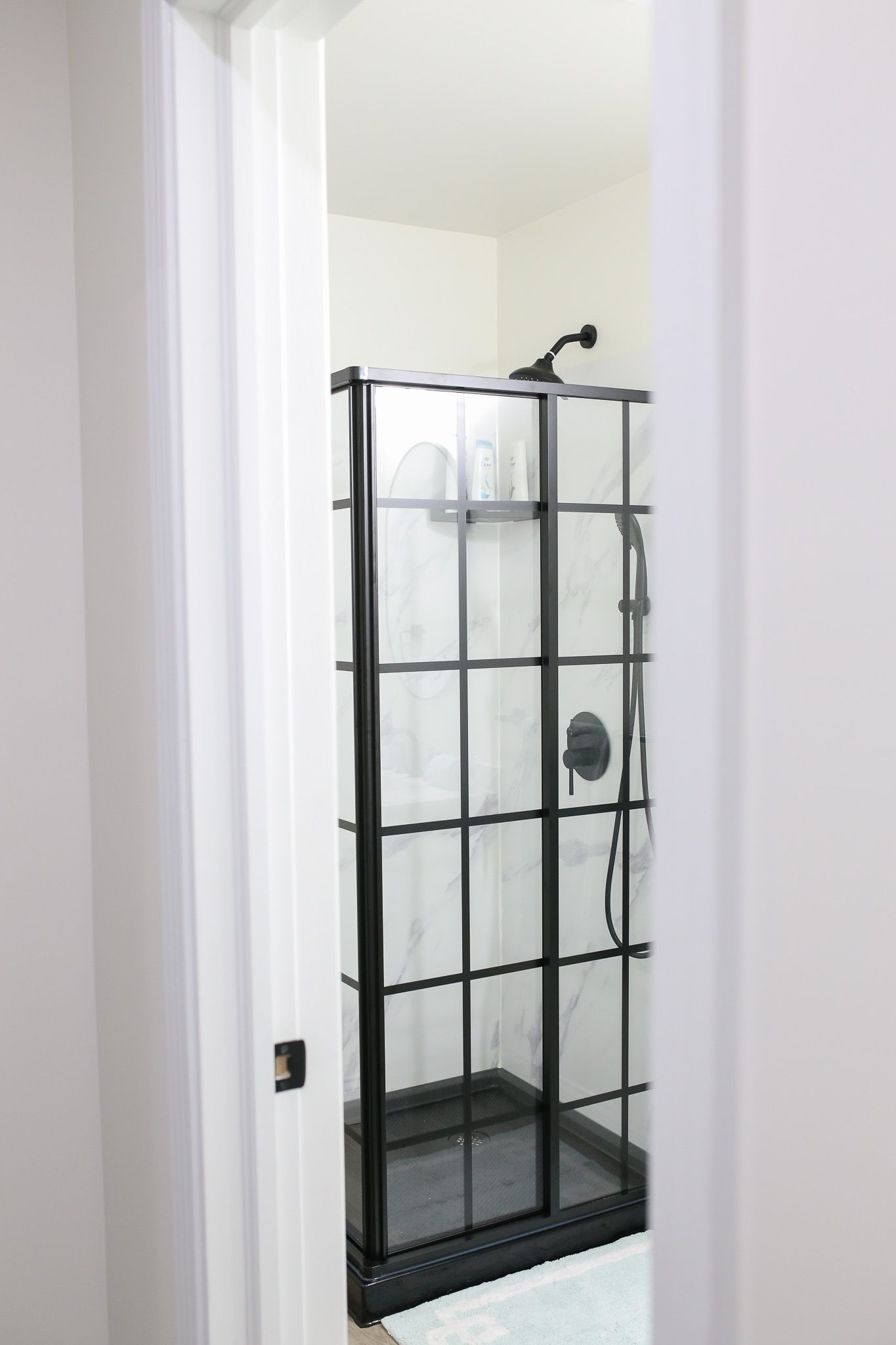 Shower with black trim surround