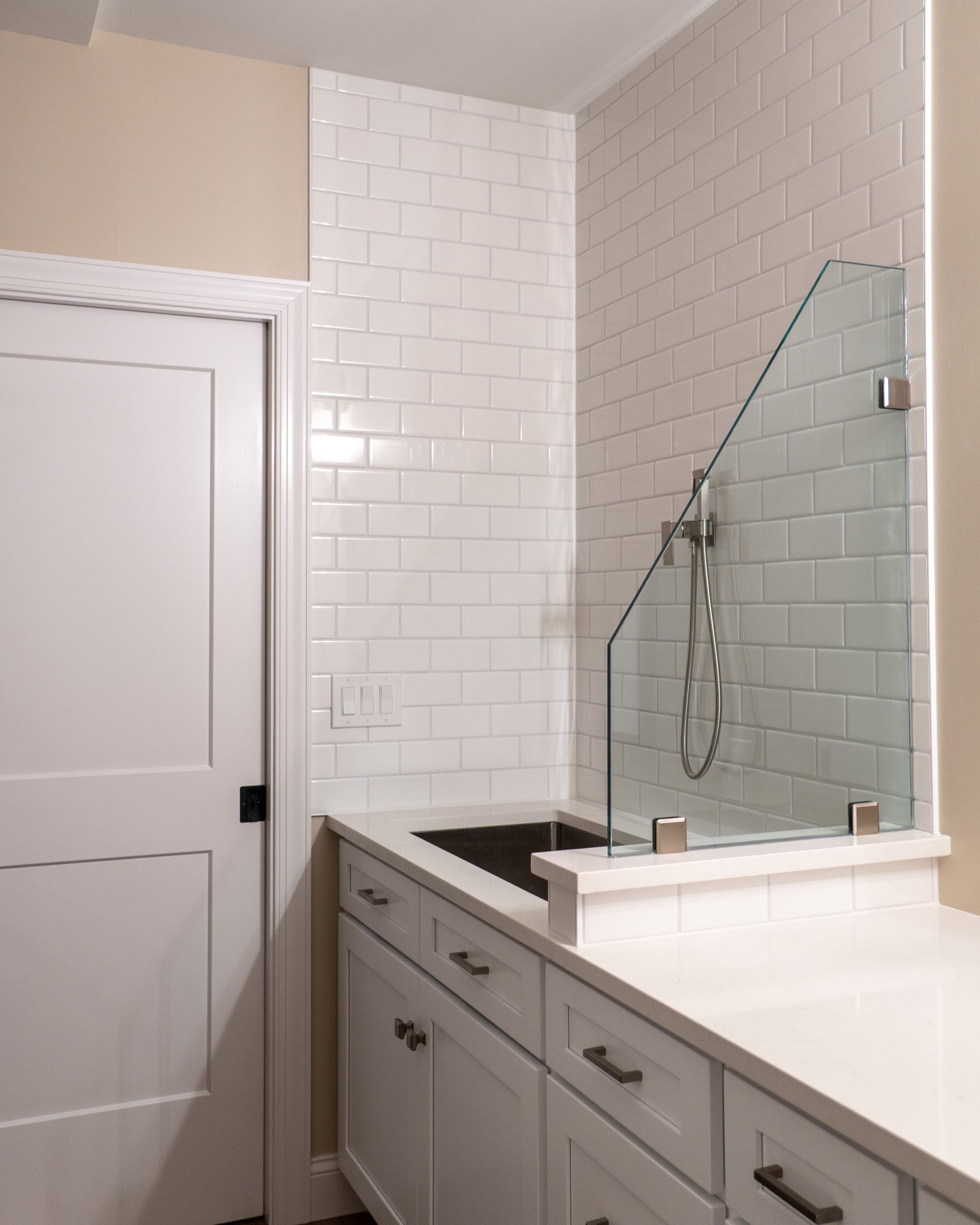 Dog wash station with white tile