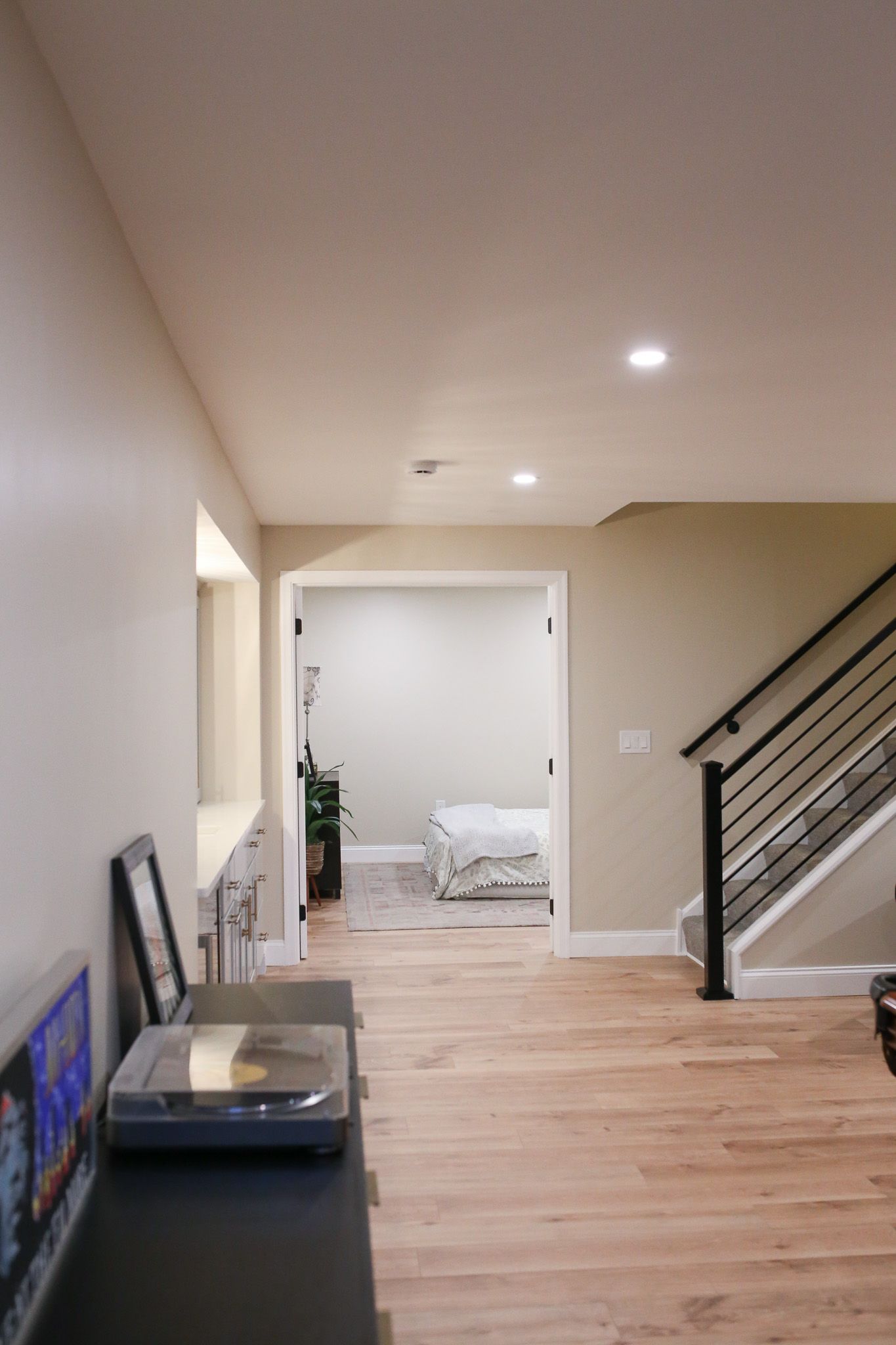 distant shot of the bedroom door and stairs