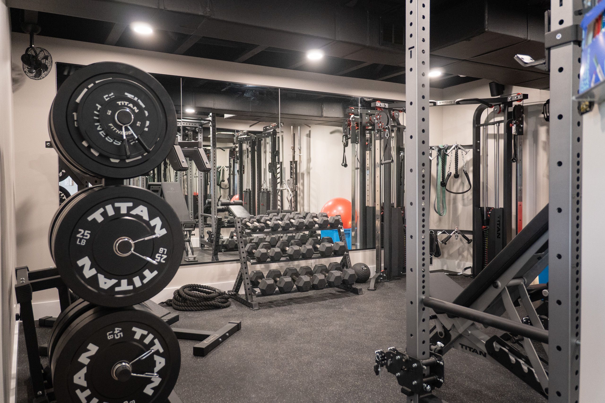 Gym with large wall mirror