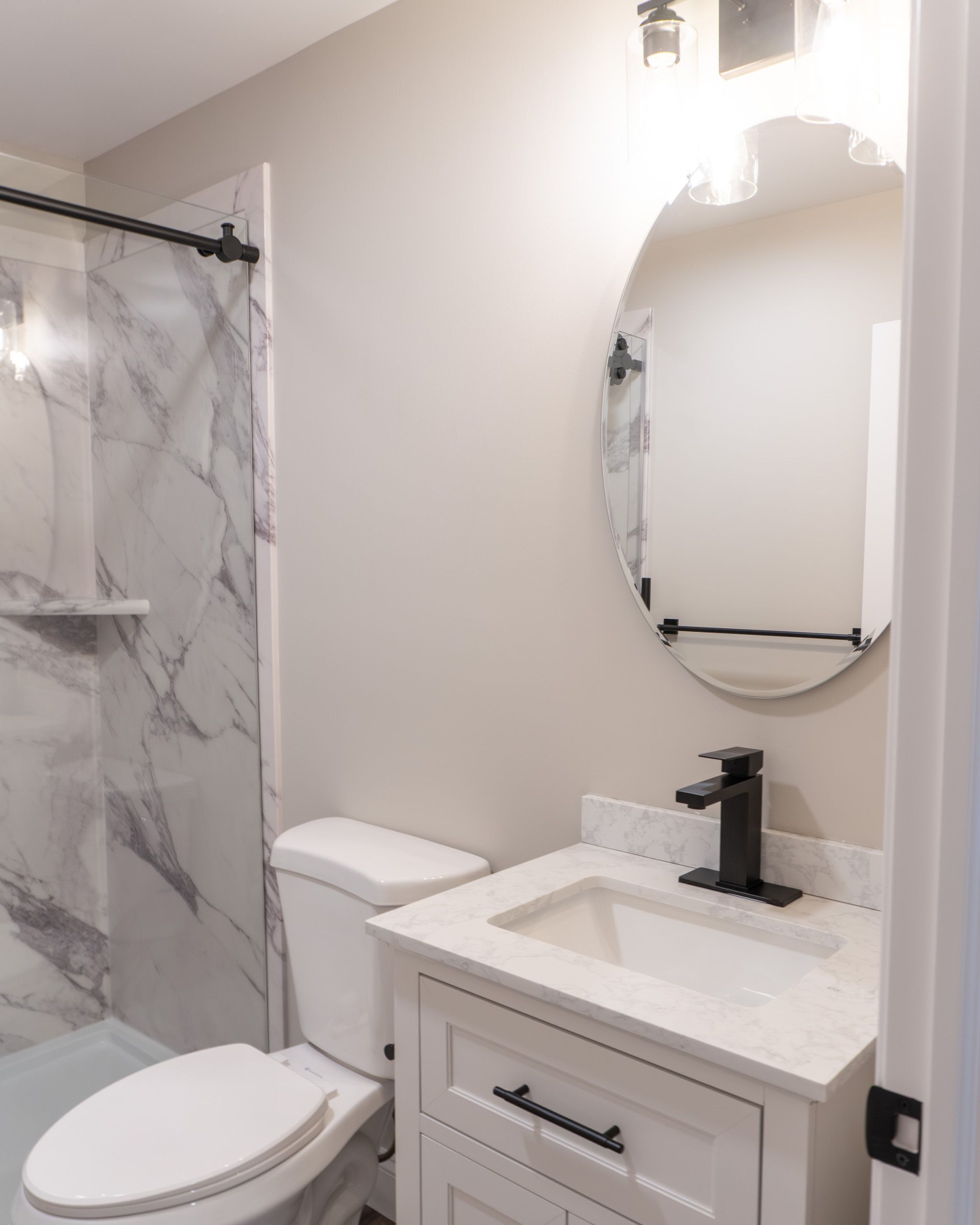 Bathroom vanity and toilet