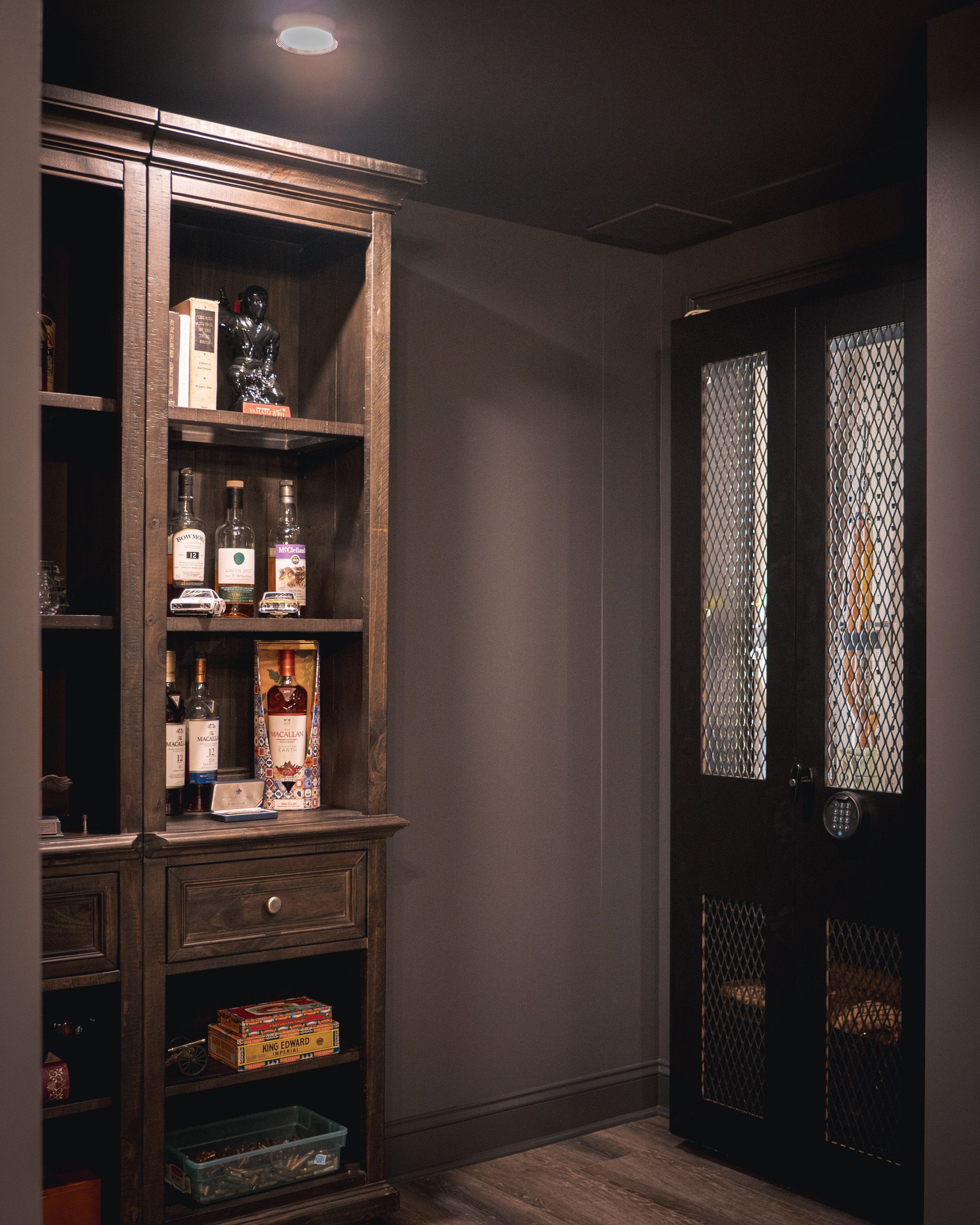 Whiskey cabinet and back of the hidden door