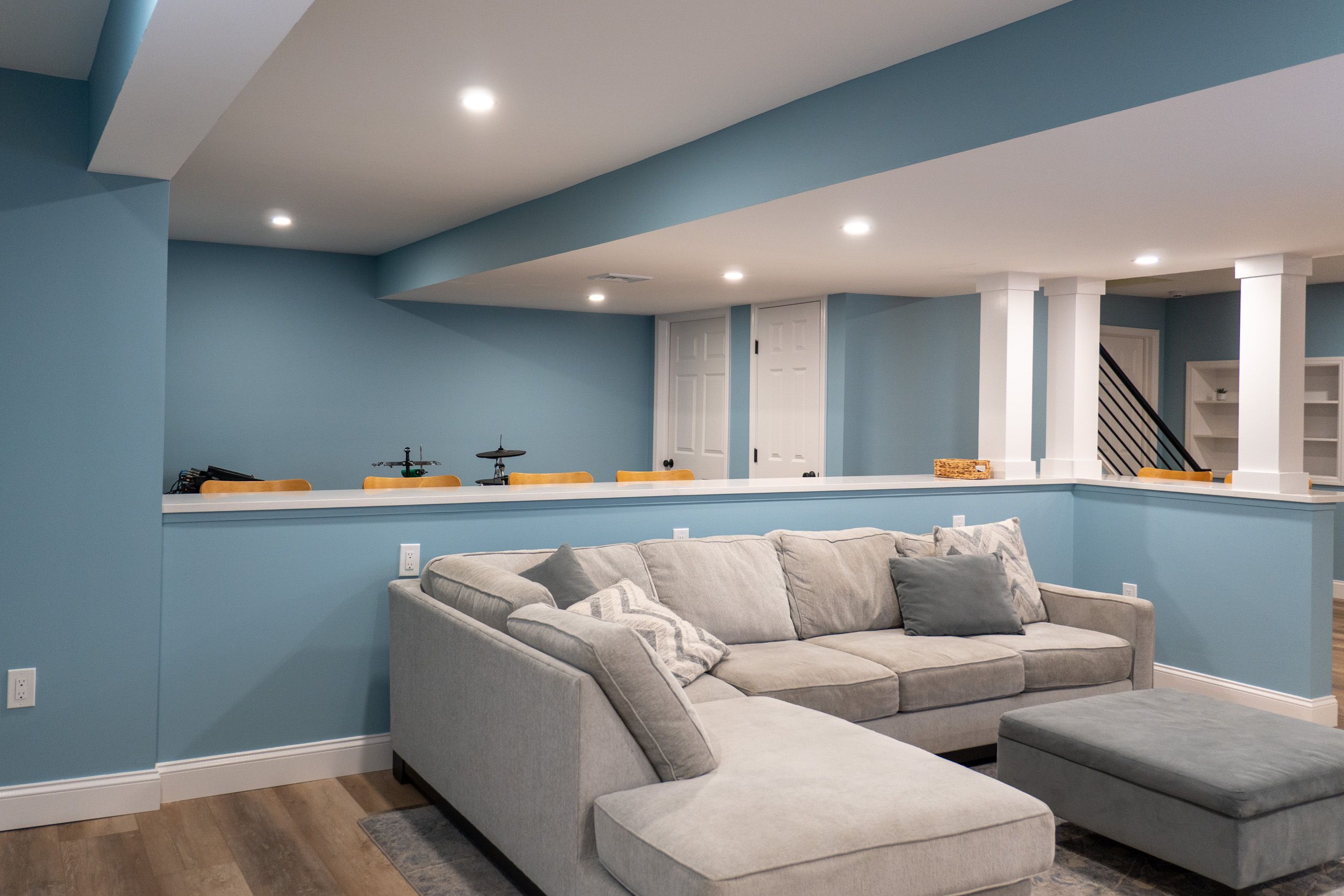 Couch area with bartop wall