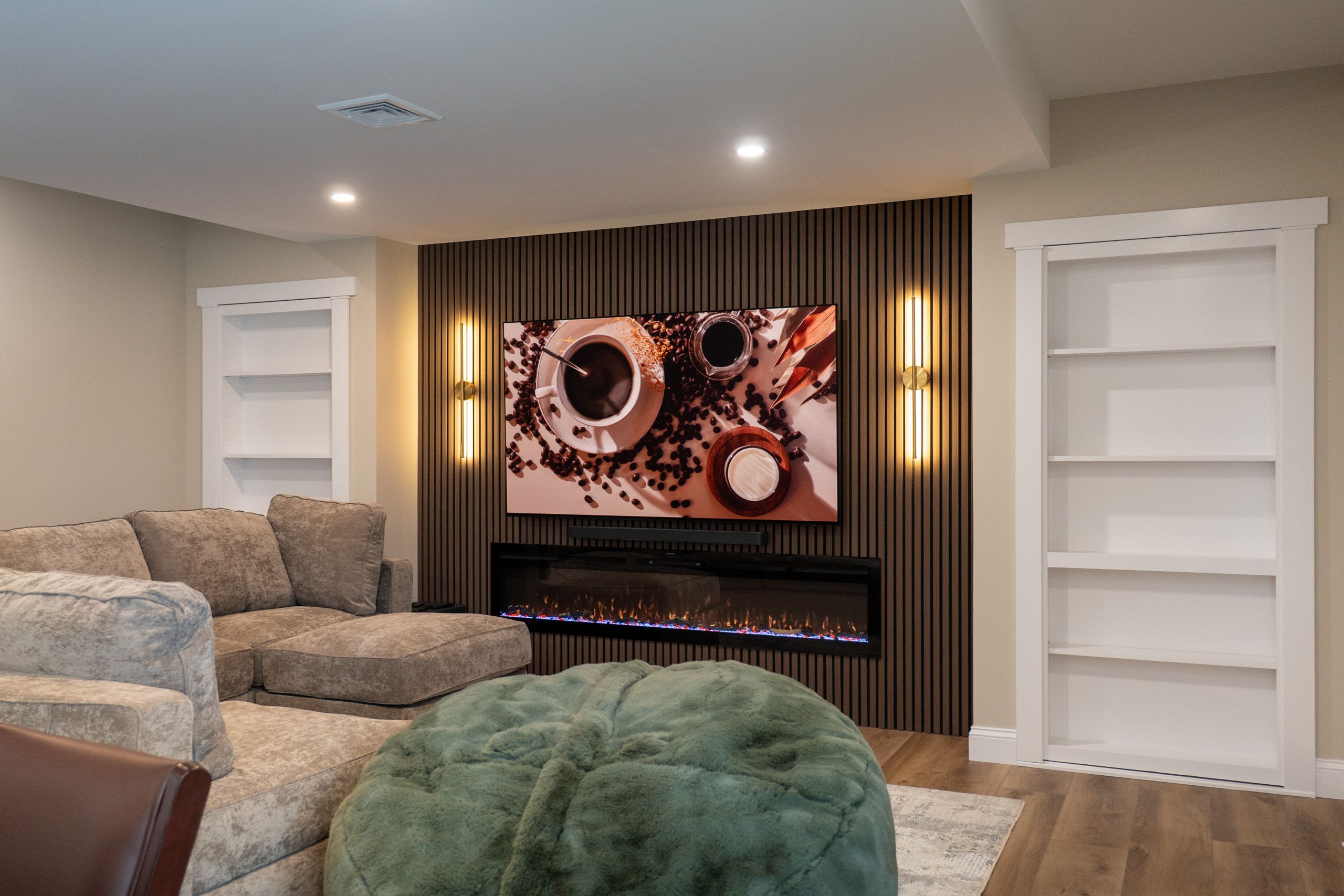 Entertainment center with a fireplace in a remodeled basement