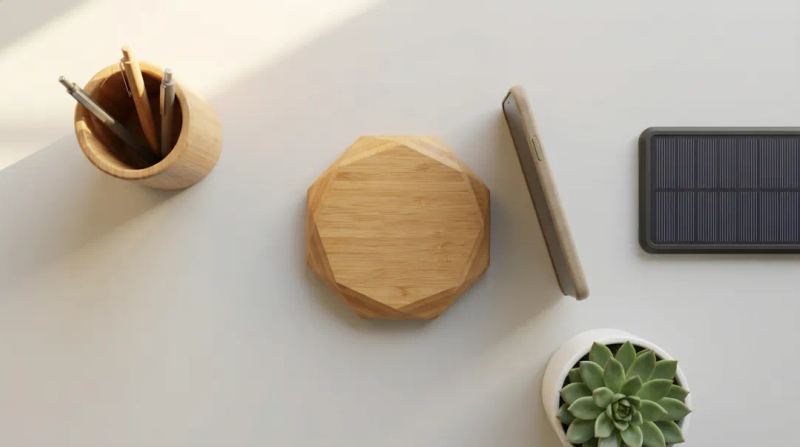 Bamboo wireless charging pad and solar charger sustainable tech accessories on desk