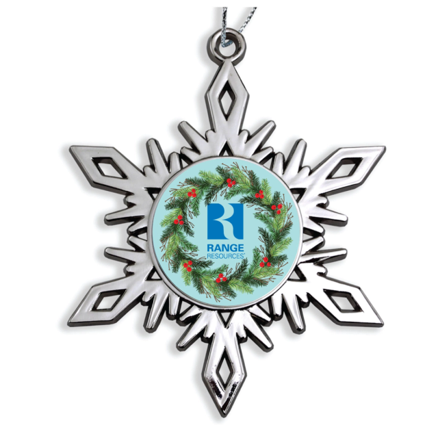 Shiny silver metal snowflake ornament with a round full-color center insert showing an evergreen wreath around the company logo, hung on a silver cord