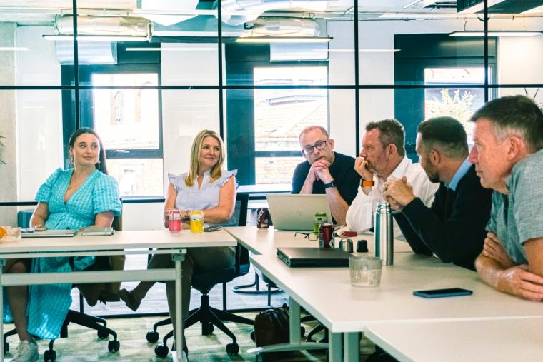 Momenta Group team working in their modern London office