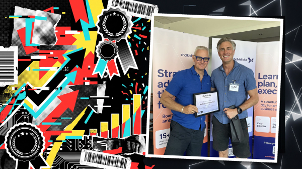Iain Godding of Inflection Point holding a Growth Collective Certificate of Achievement at the event, set against an Inflection Point branded collage of award ribbons, laurels and upward growth arrows.