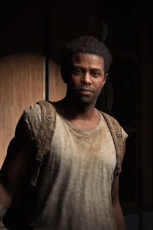 Henry stands at the entrance to his and Sam’s safehouse, looking toward the camera with a neutral but friendly expression.
