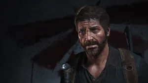 A close up of Joel glancing to the side with a look of worry and fear. Directly behind his head is the Firefly logo, spraypainted in red.