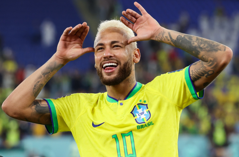 A young Neymar Jr smiling and controlling a soccer ball in Brazil