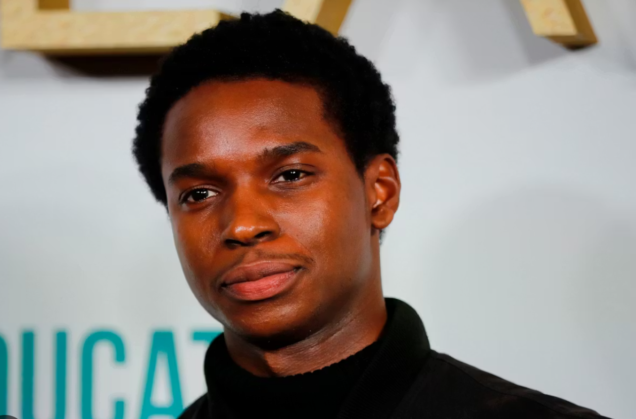 Kedar Williams-Stirling Net Worth article featuring the British actor at a red carpet event during his rising television career