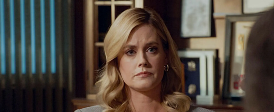 Abigail Hawk portrait smiling in a simple pose