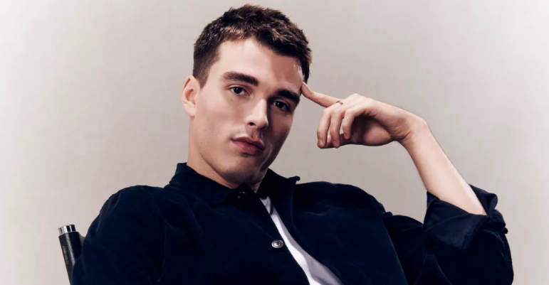 Corey Mylchreest, the actor known as the regal heartthrob, posing for a professional portrait in 2026.