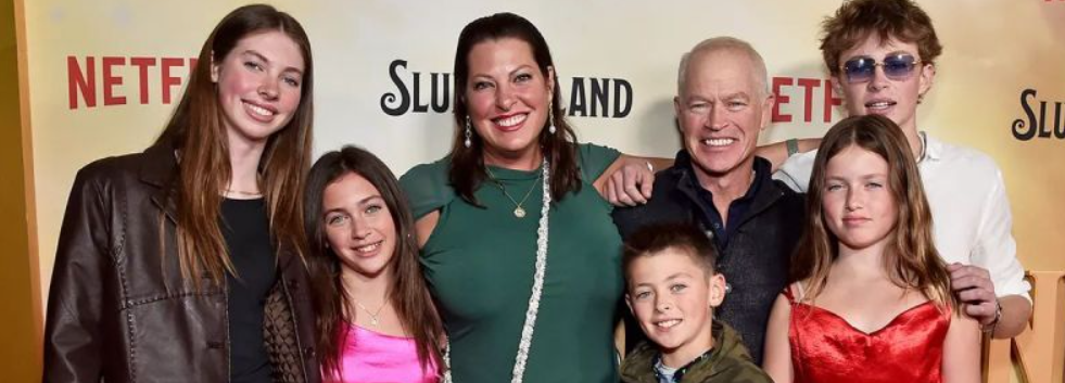 Morgan Patrick McDonough standing with his father, Neal McDonough, at a public film premiere event.