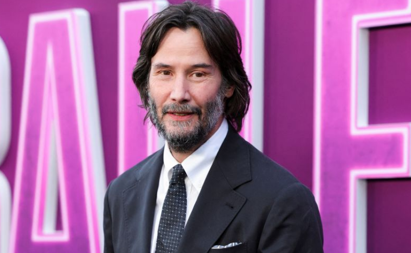 Keanu Reeves playing his famous character Neo in the science fiction movie The Matrix.