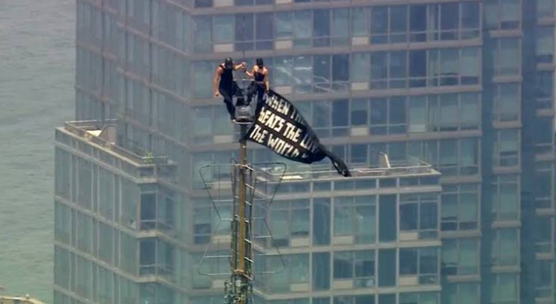 Empire State Building couple during the proposal on the restricted spire in New York before authorities filed criminal charges.